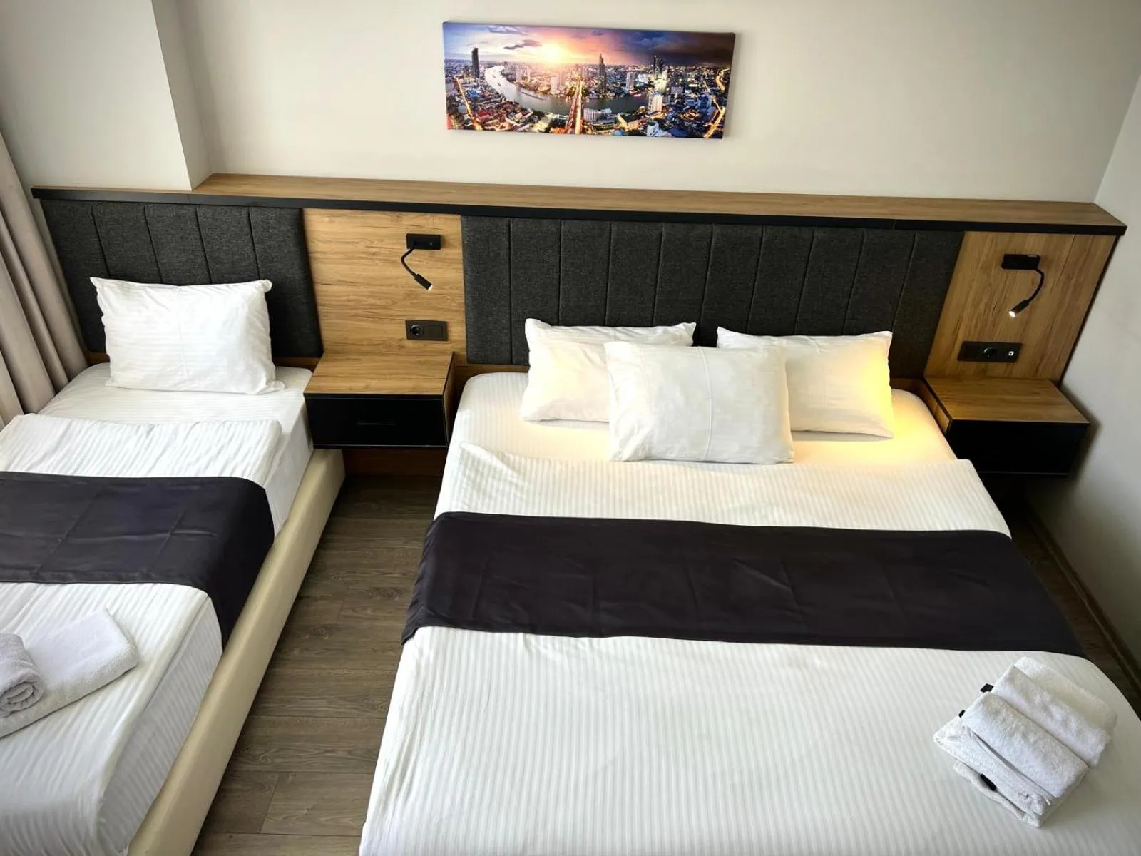 Bed in Comfort Center Suit Hotel