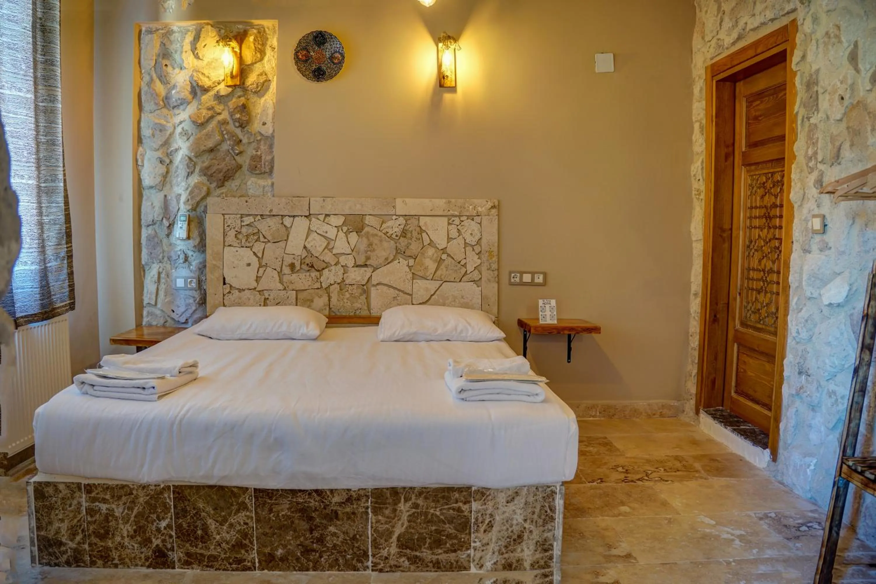 Bed in Ala Stone House