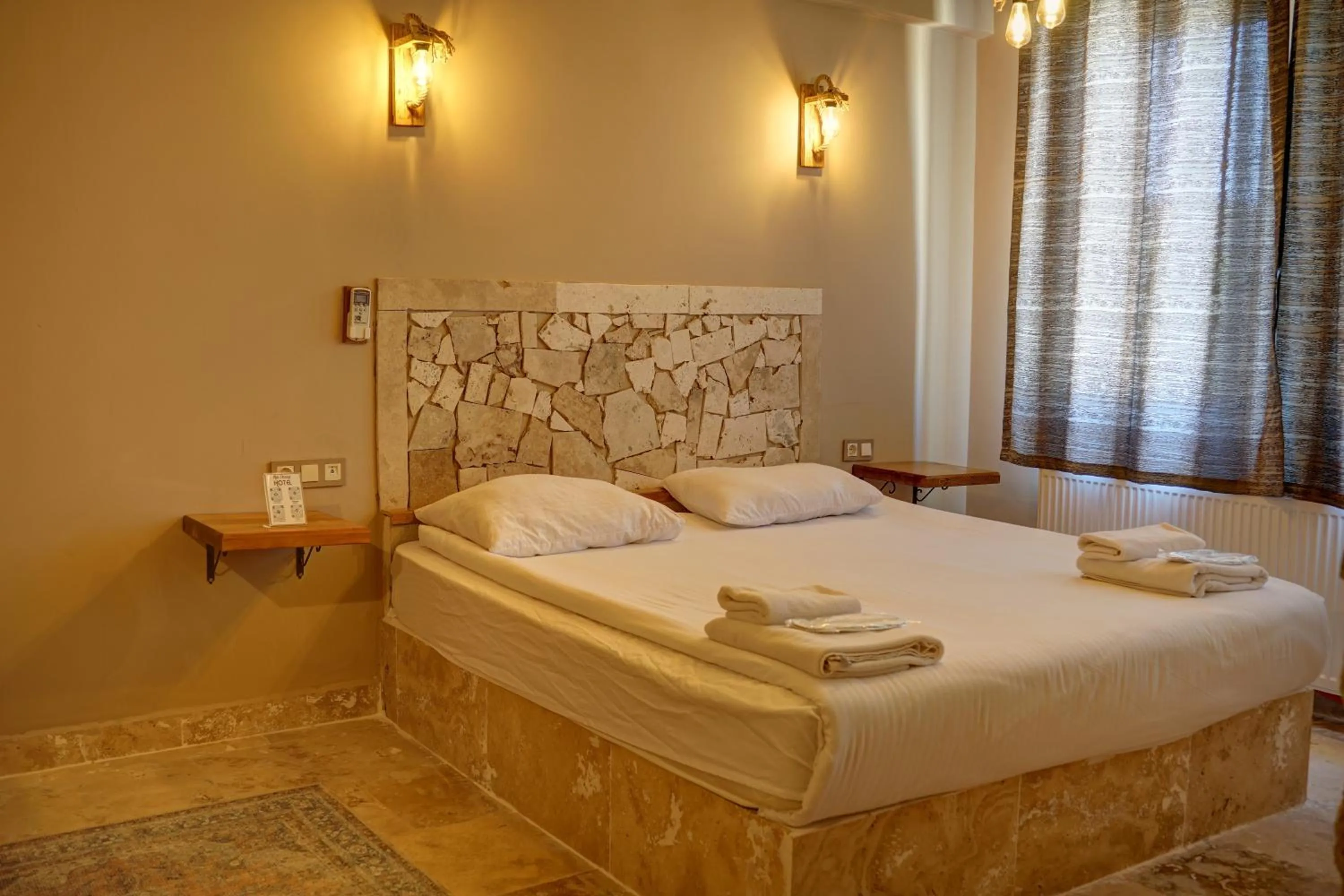 Bed in Ala Stone House