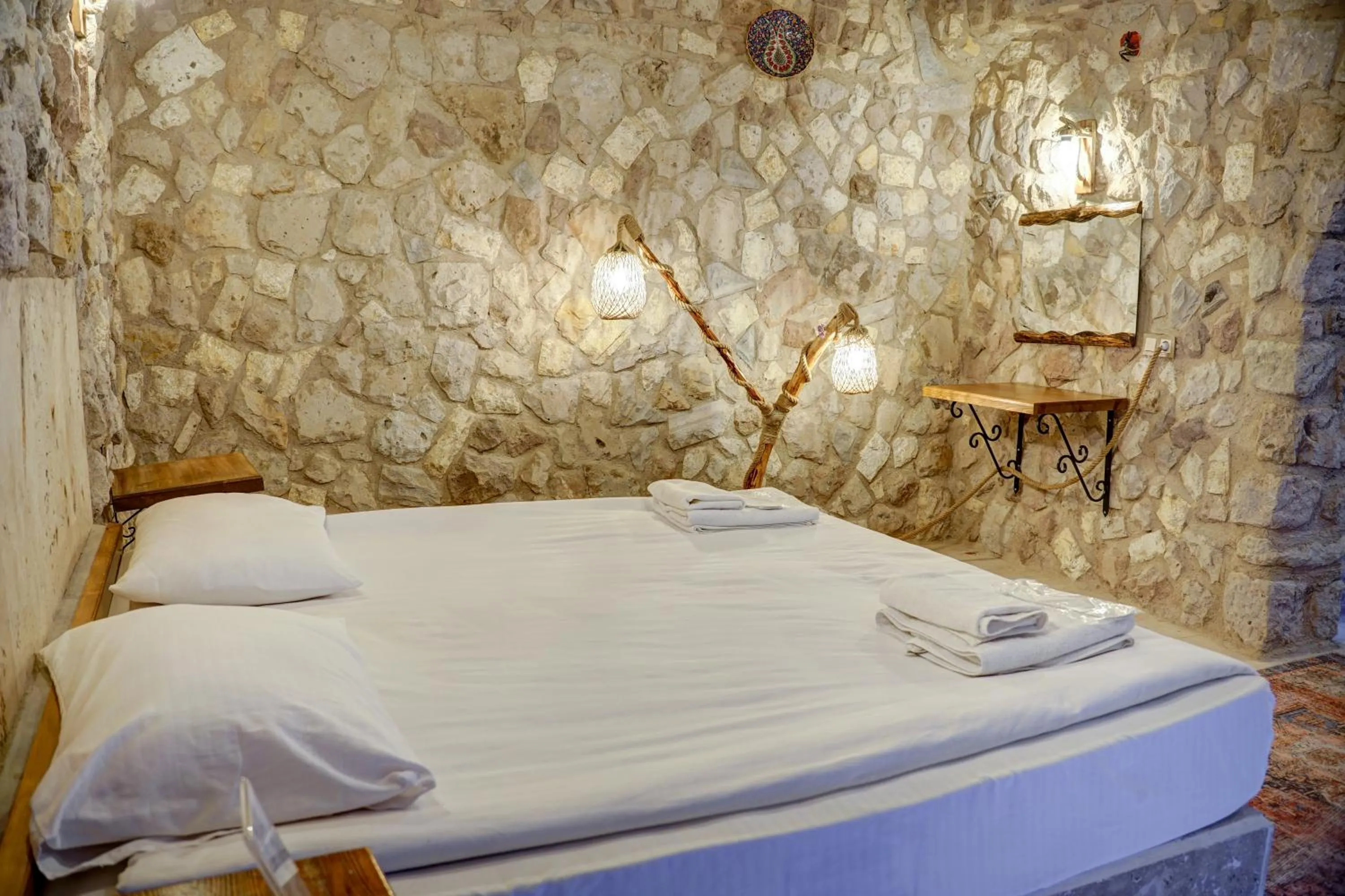 Bed in Ala Stone House