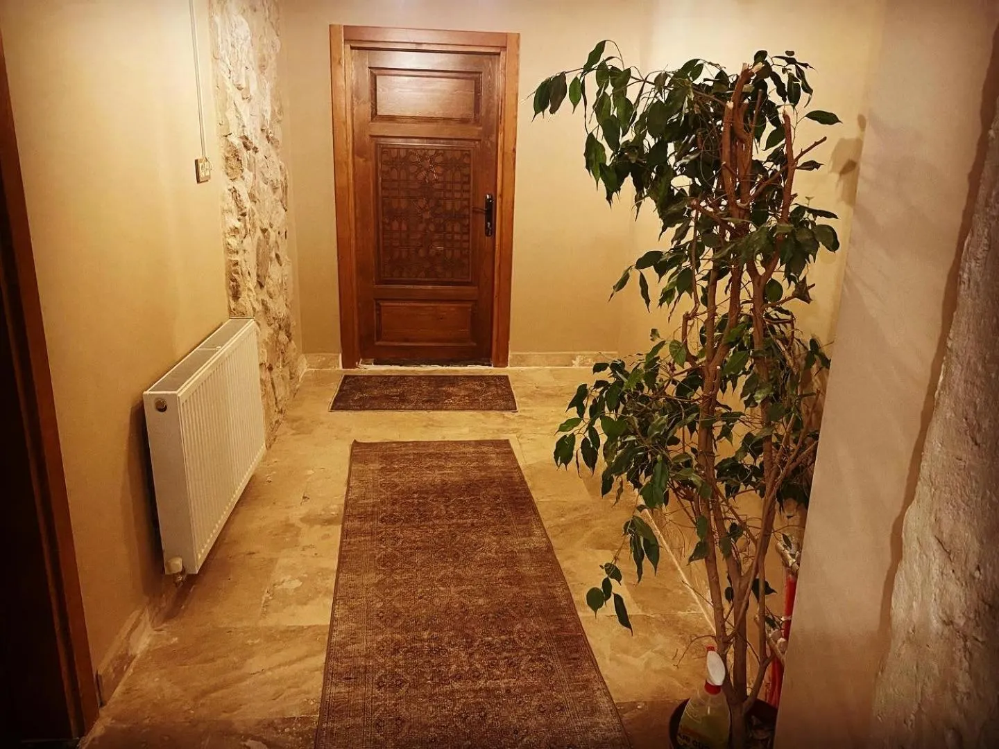 Facade/entrance in Ala Stone House