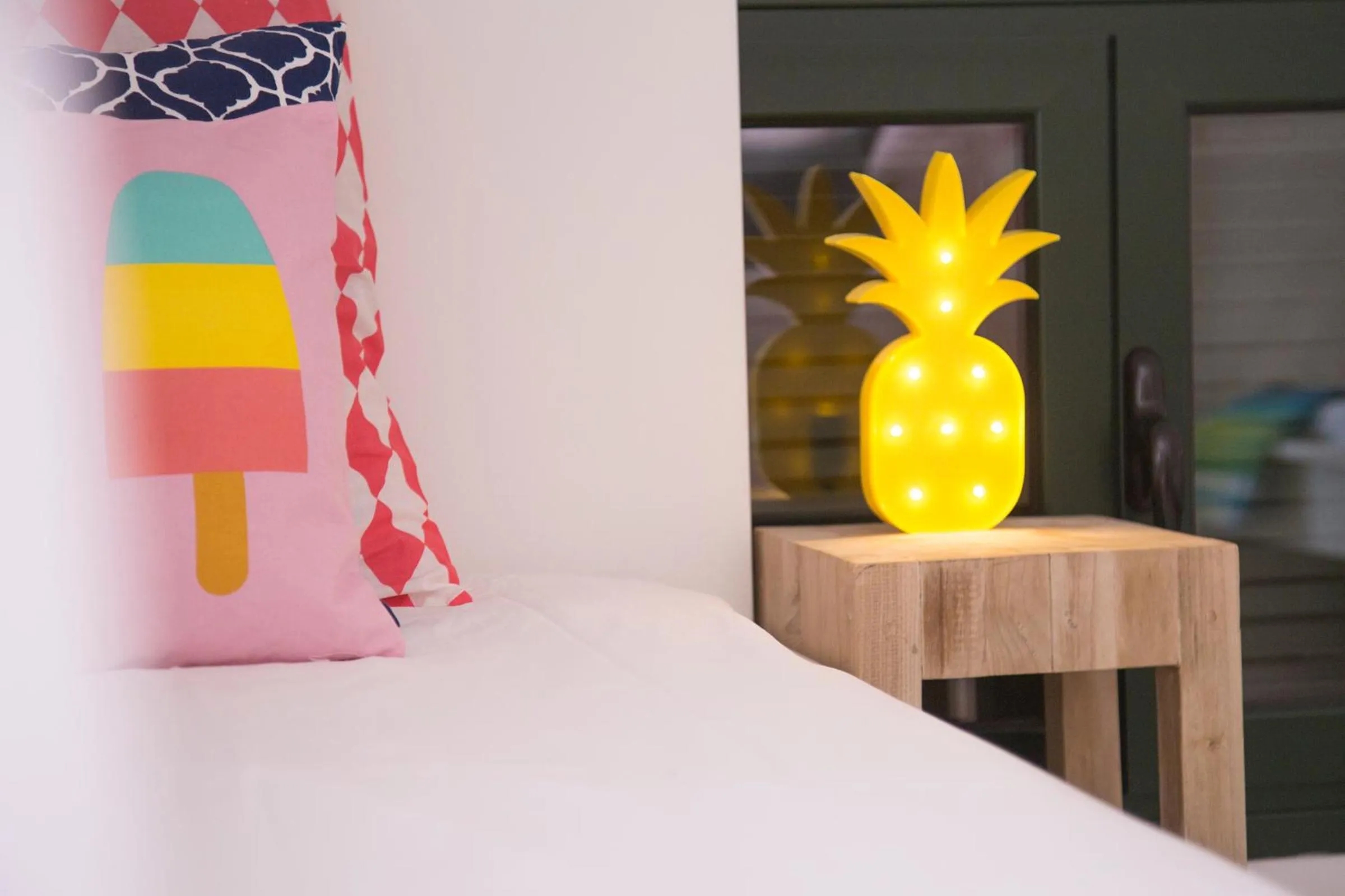 Bed in Oliva Holiday Homes