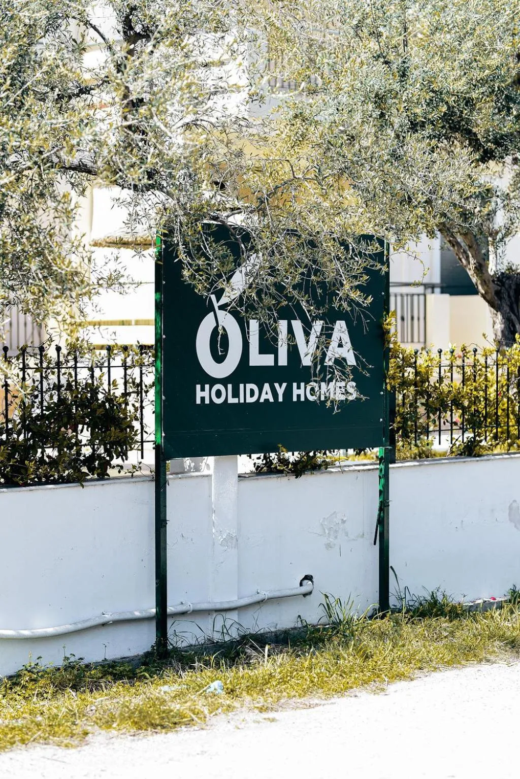 Property logo or sign in Oliva Holiday Homes