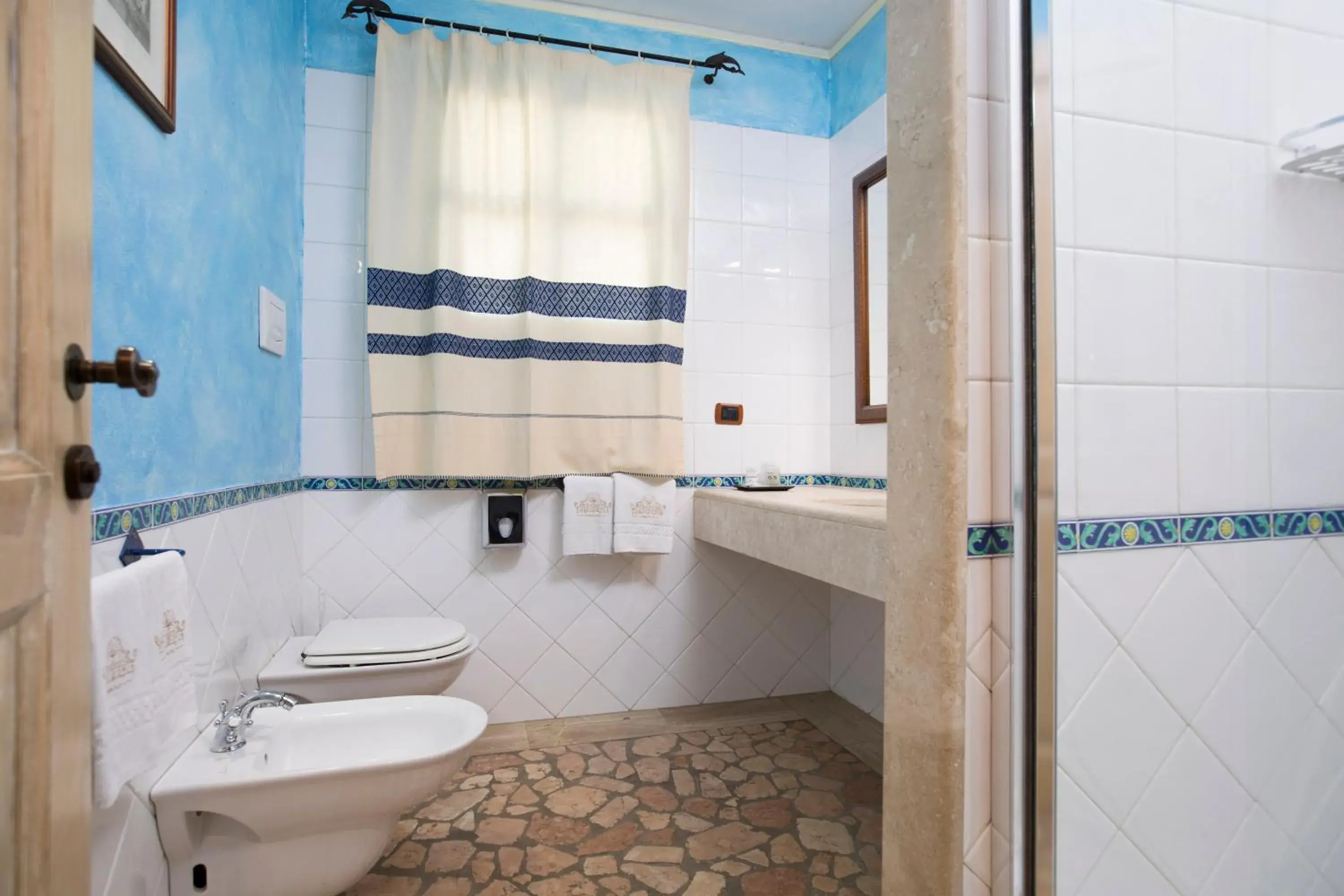 Triple Room in Hotel Poseidonia Triple Room in Hotel Poseidonia