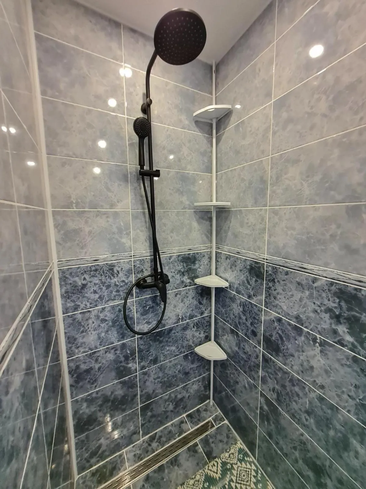 Shower in apartman Goga with pool and jacuzzi