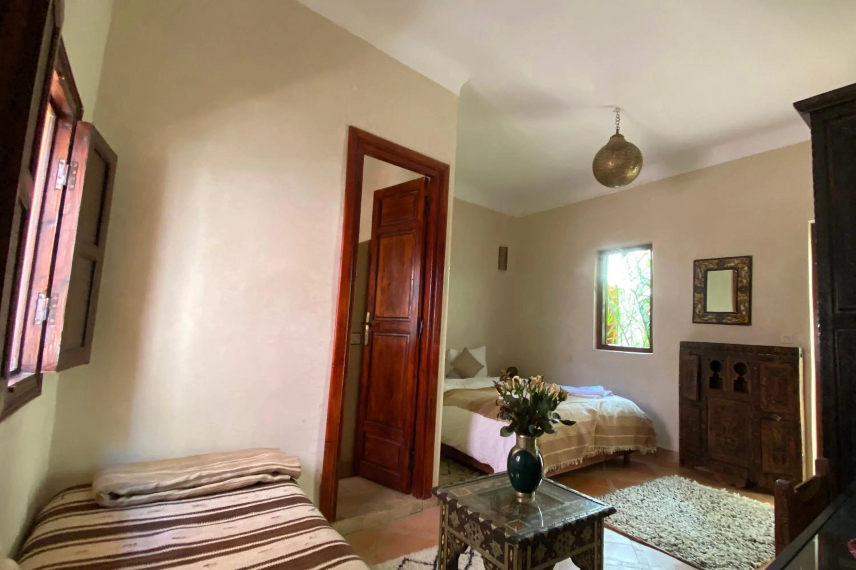 Seating area, Bed in Riad Of The Storks