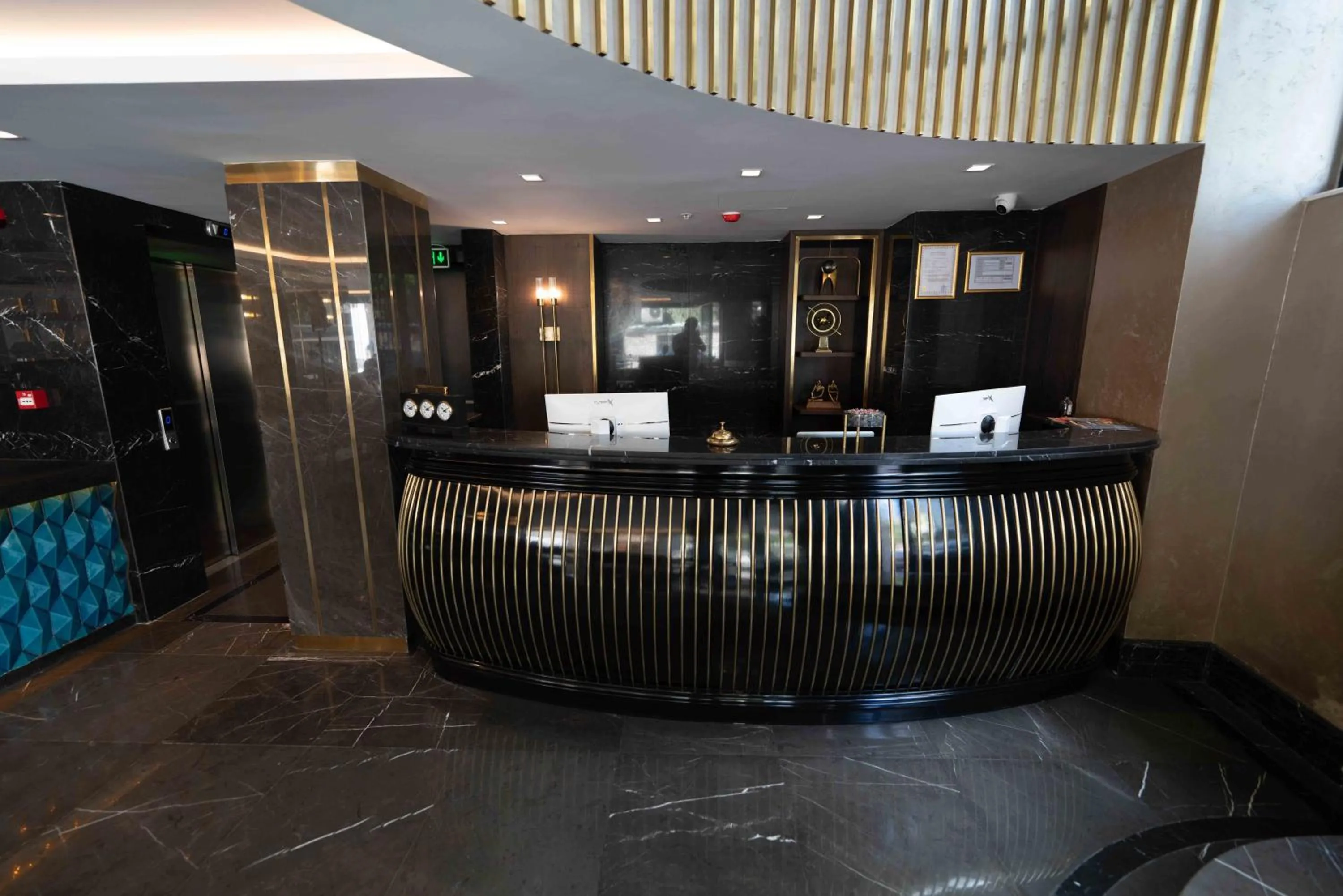 Lobby or reception in Costera Hotel