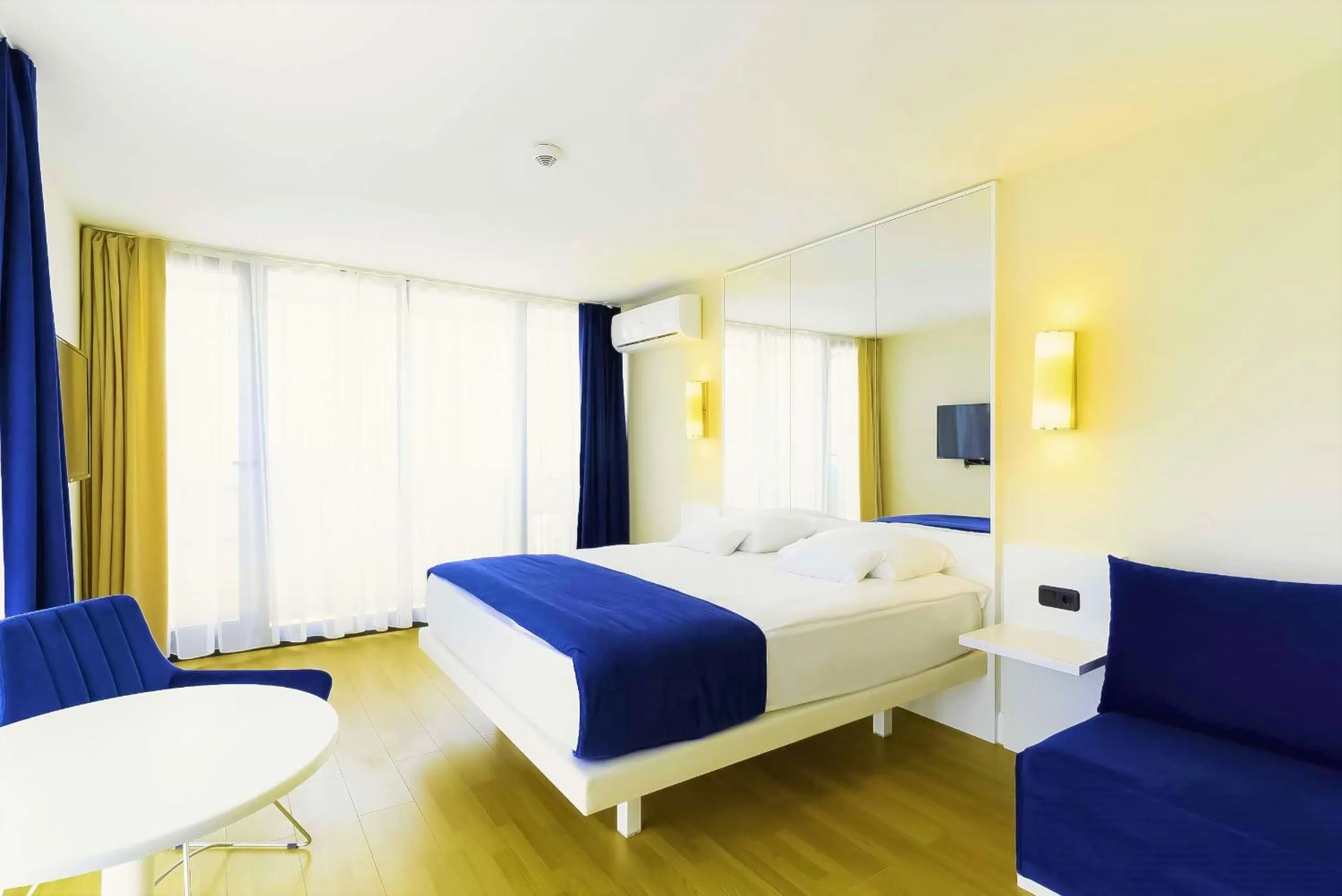 Bed in Orbi City Hotel With Sea View