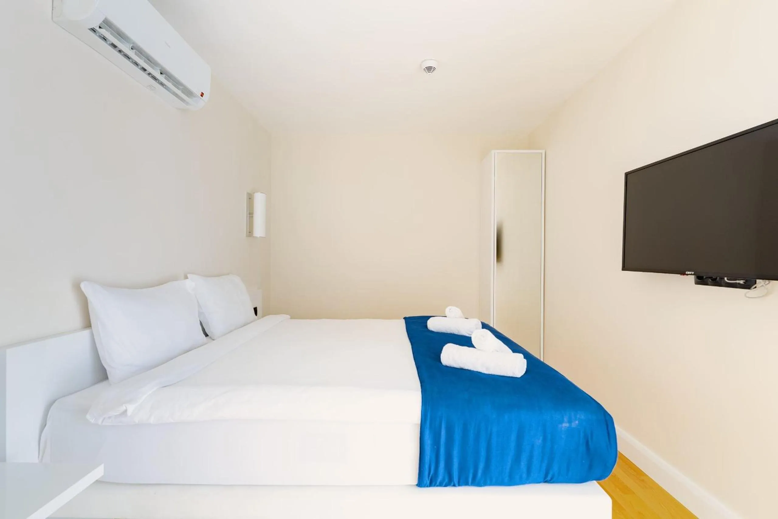 Communal lounge/ TV room in Orbi City Hotel With Sea View