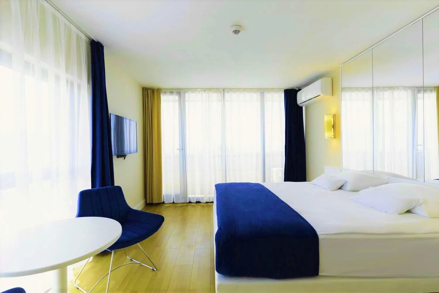 Bed in Orbi City Hotel With Sea View