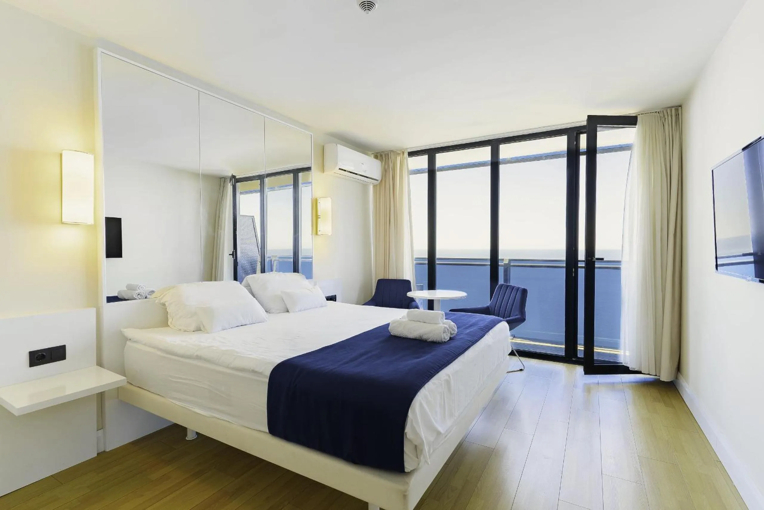 Bed in Orbi City Hotel With Sea View