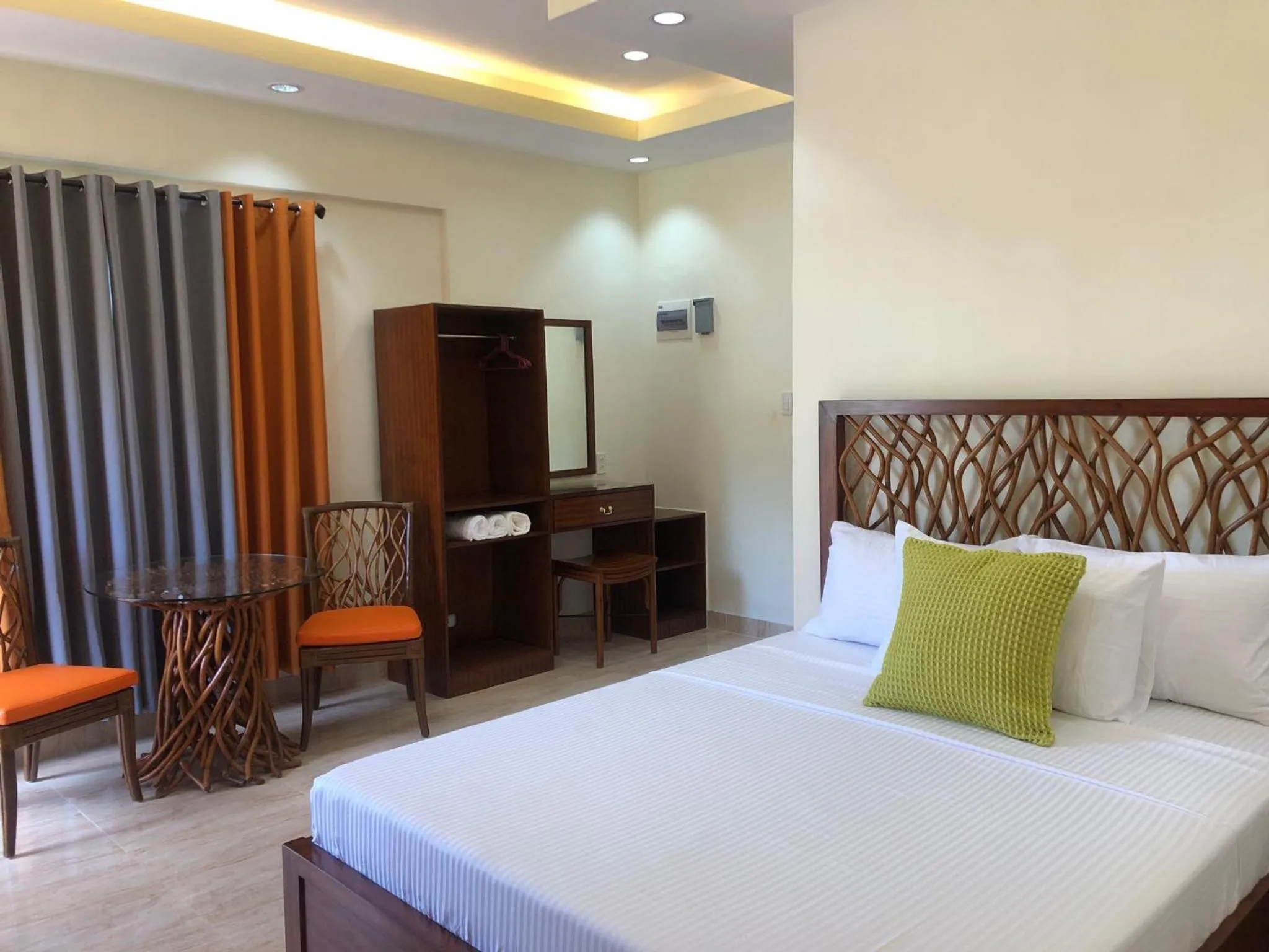 Bed in PMG Islandscape Resort