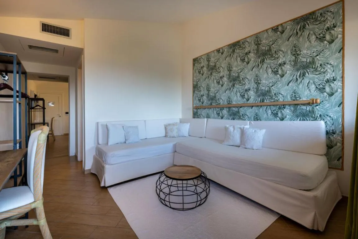 Living room, Bed in Hotel Palau