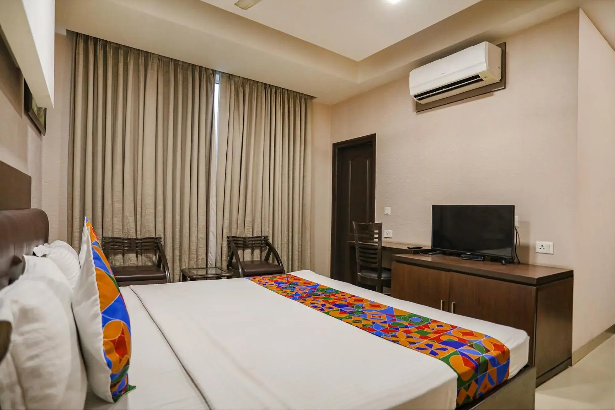 Bed in FabHotel Grand Olive Bed in FabHotel Grand Olive