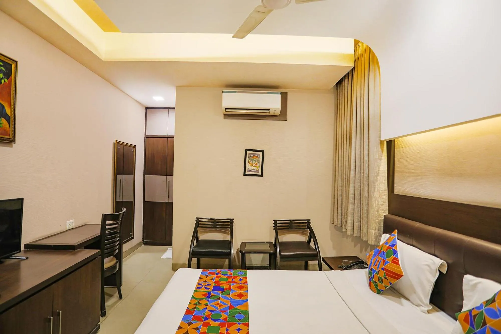 Bed in FabHotel Grand Olive