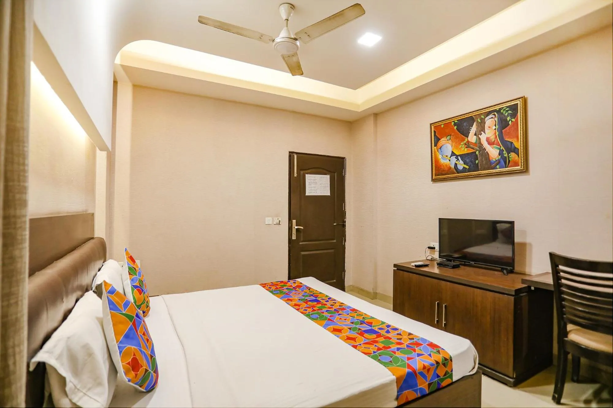 Bed in FabHotel Grand Olive