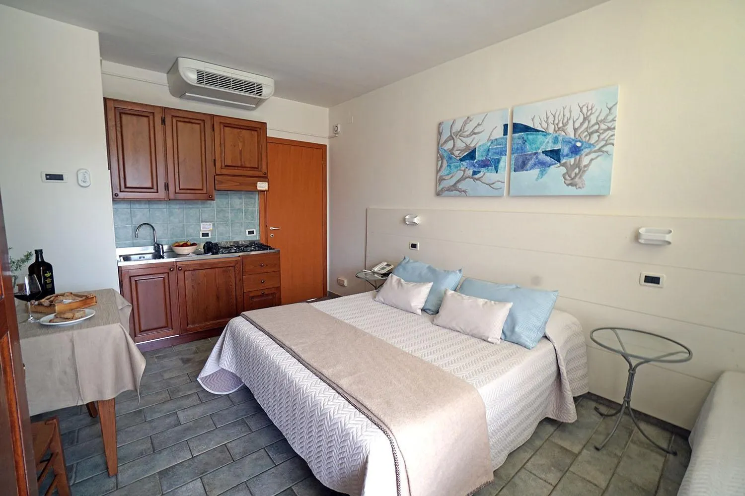 Kitchen or kitchenette, Bed in Hotel Residence La Ventola