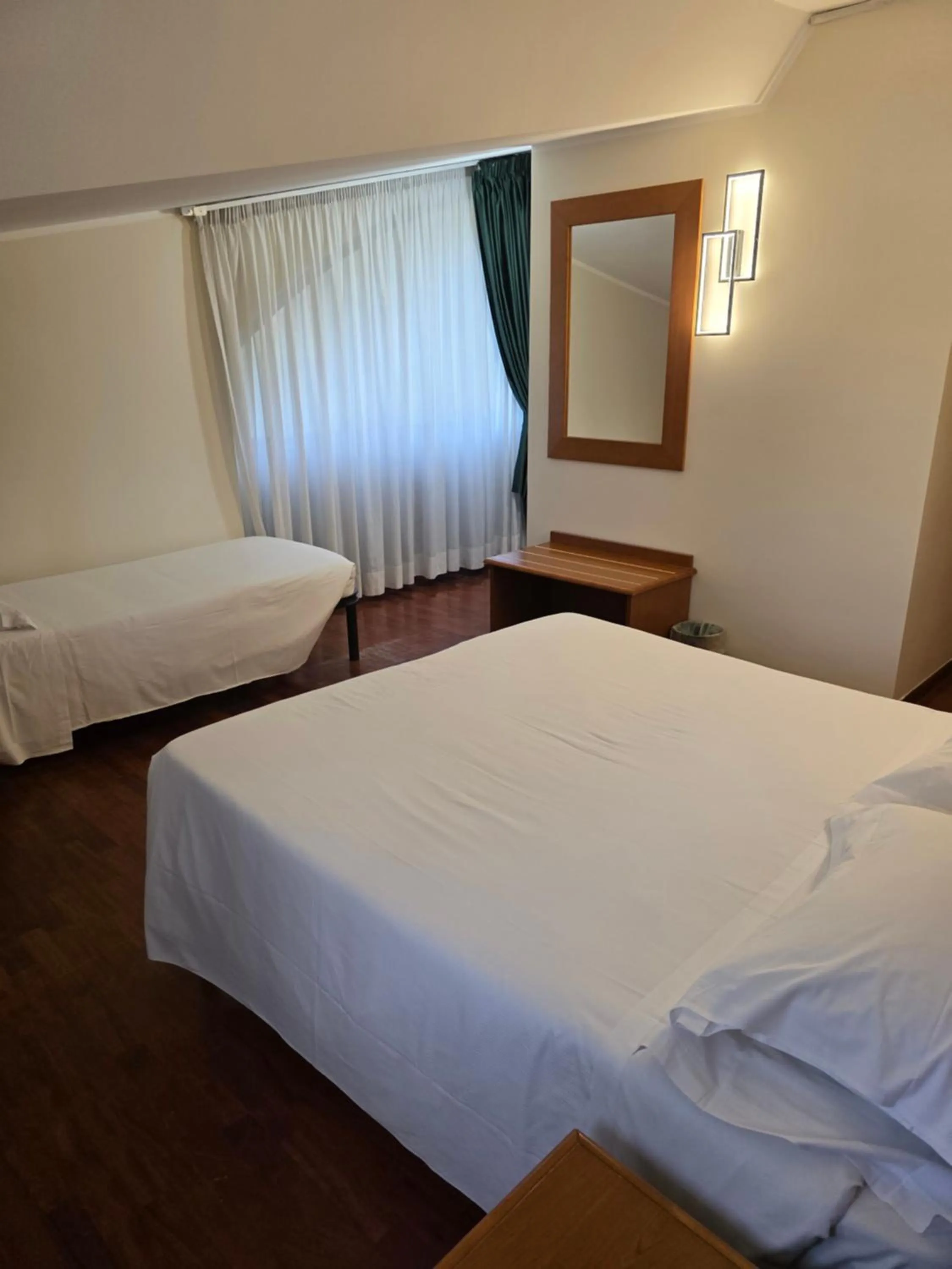 Bed in Hotel Dimora Adriana