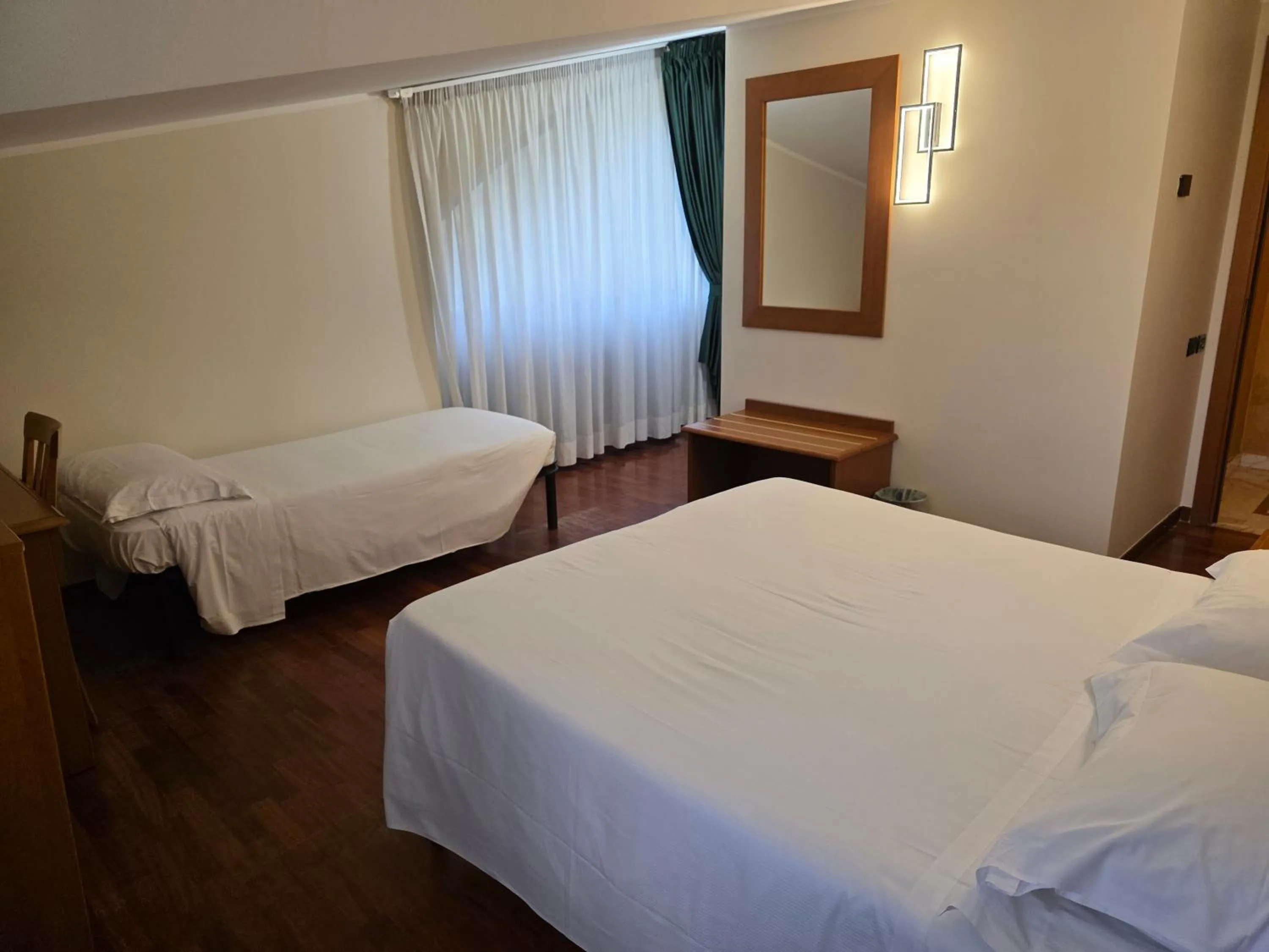 Bed in Hotel Dimora Adriana