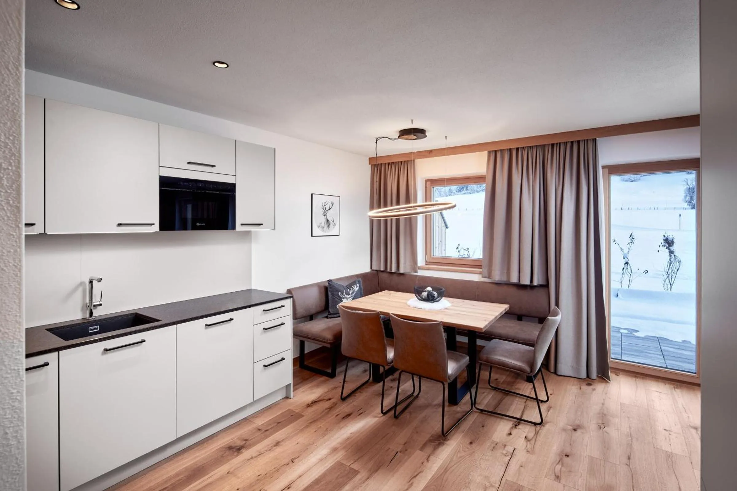 Kitchen or kitchenette in Alpin Residenzen Buchensteinwand St. Ulrich by Alpina-Holiday