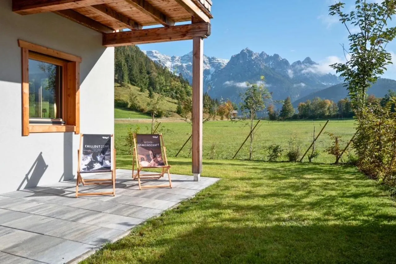 Garden in Alpin Residenzen Buchensteinwand St. Ulrich by Alpina-Holiday