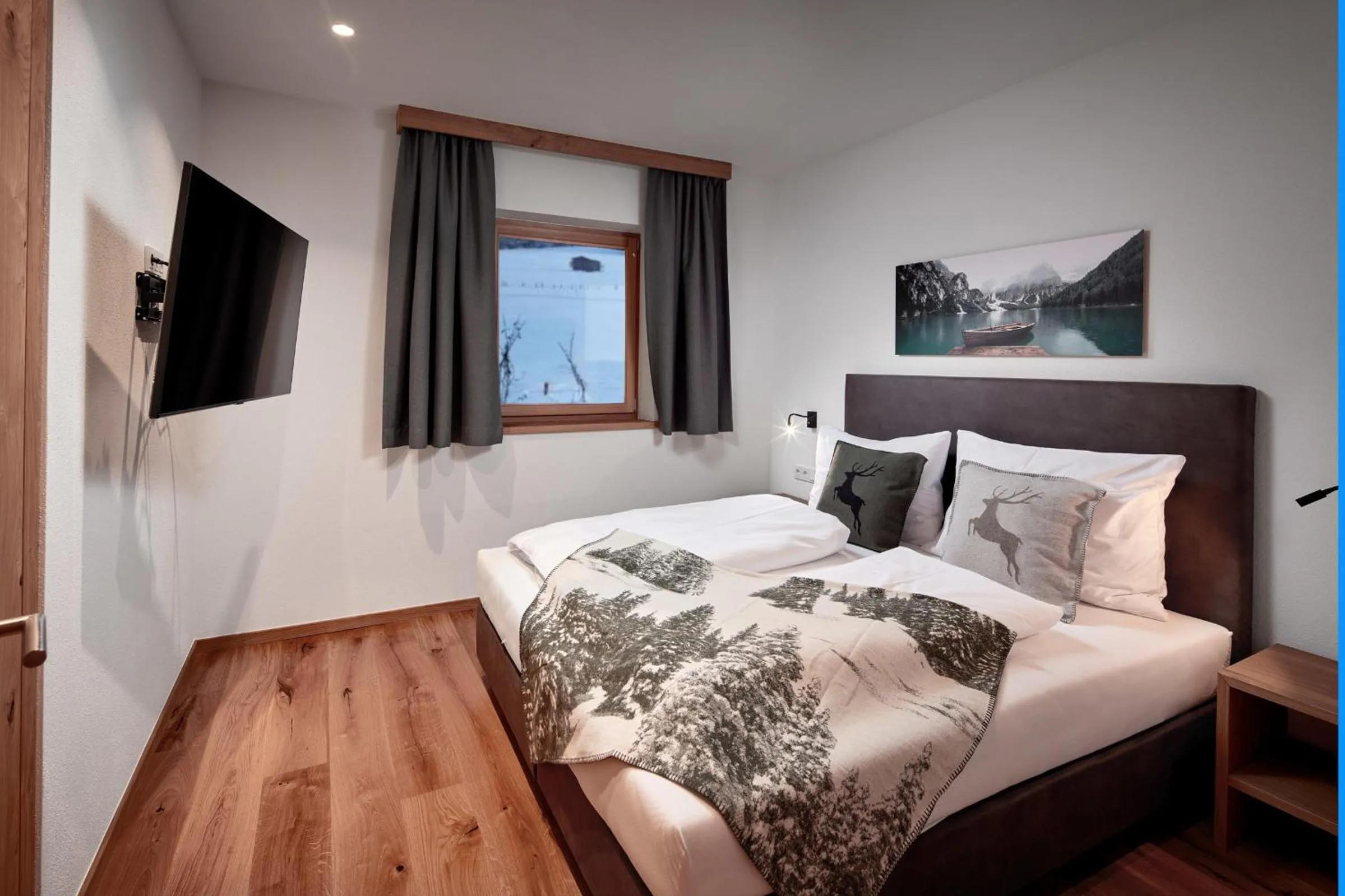 Bedroom, Bed in Alpin Residenzen Buchensteinwand St. Ulrich by Alpina-Holiday