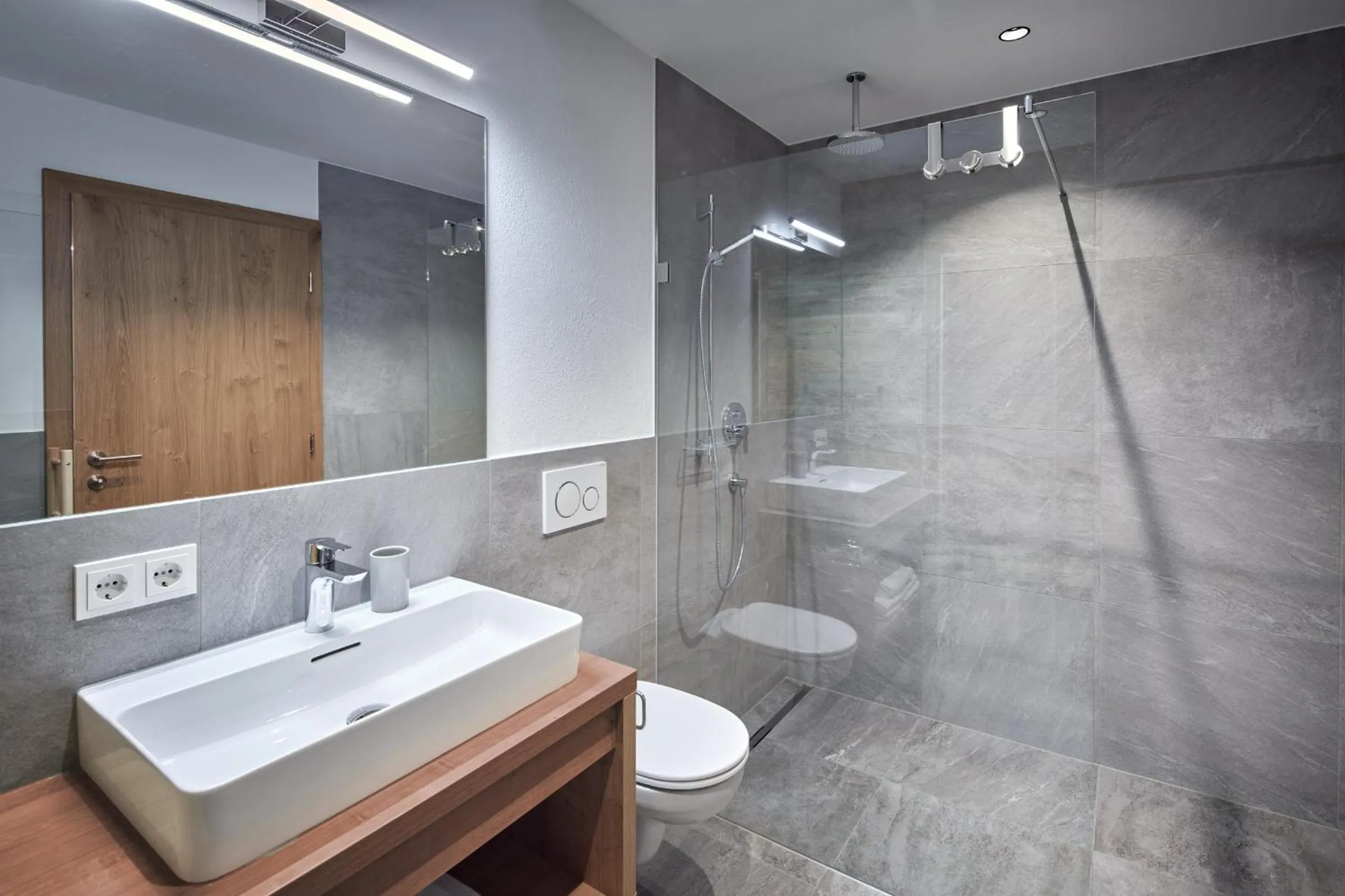 Shower in Alpin Residenzen Buchensteinwand St. Ulrich by Alpina-Holiday