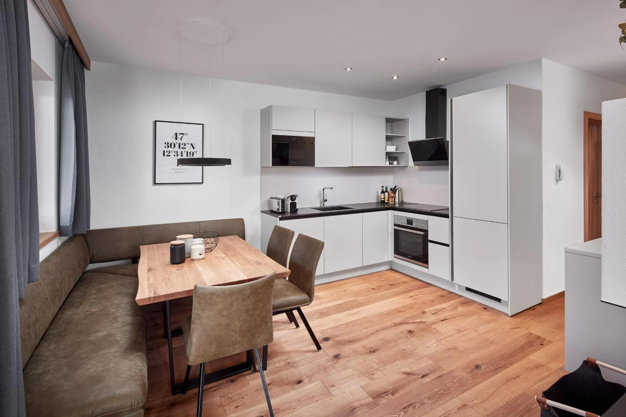 Kitchen or kitchenette in Alpin Residenzen Buchensteinwand St. Ulrich by Alpina-Holiday