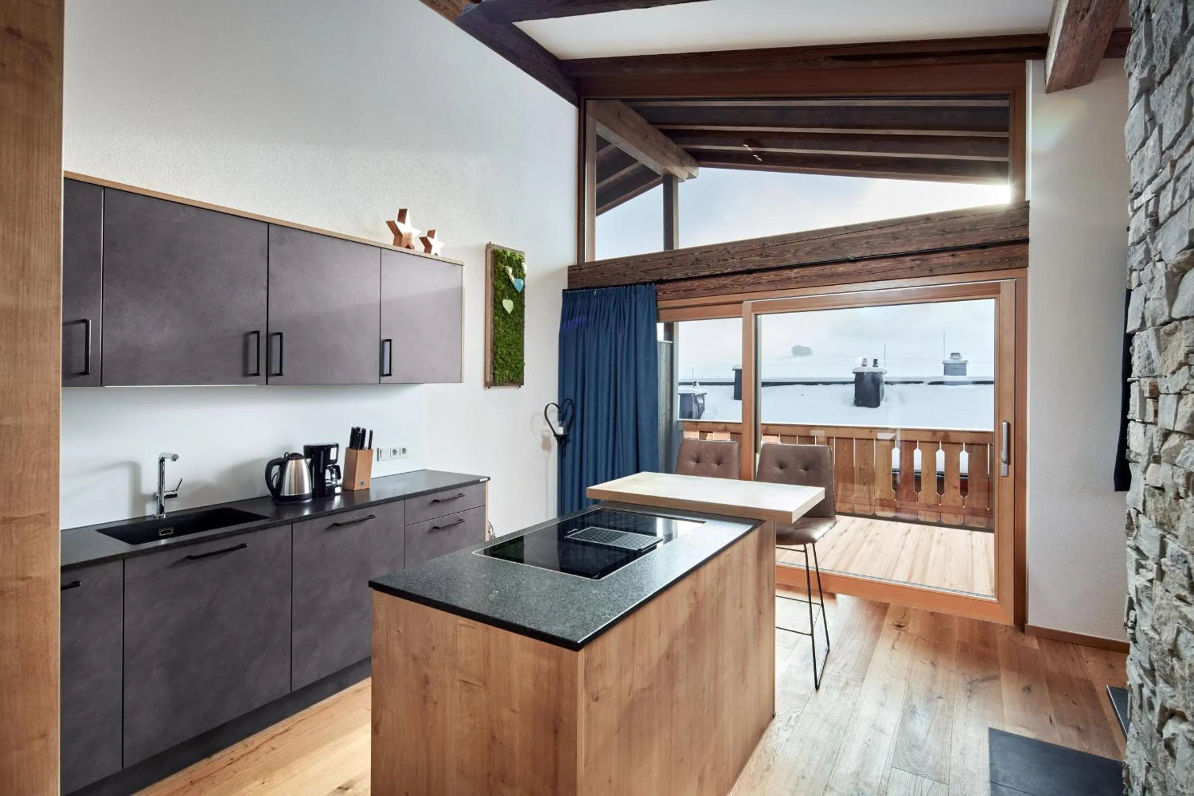 Kitchen or kitchenette in Alpin Residenzen Buchensteinwand St. Ulrich by Alpina-Holiday