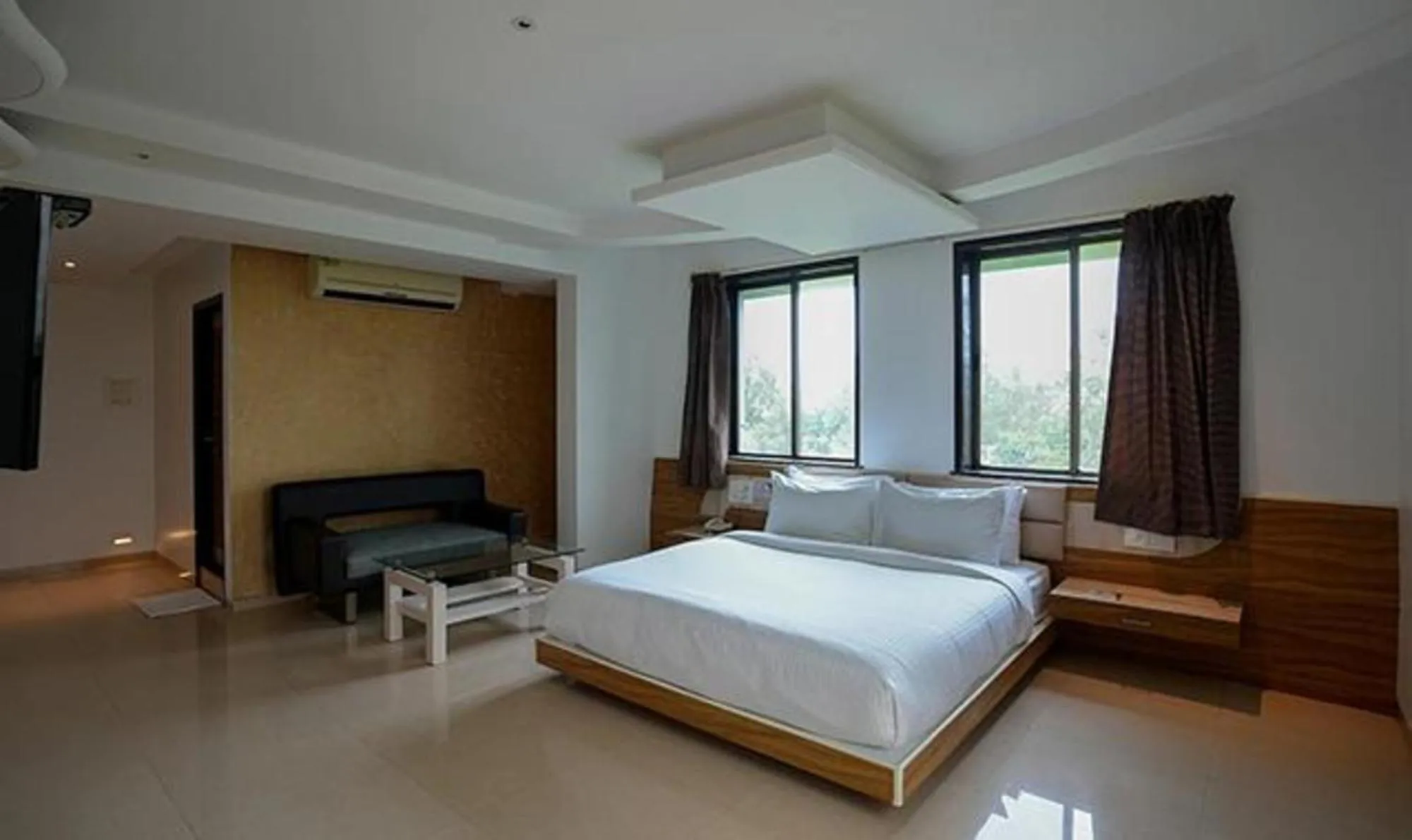 Bed in FabHotel Prime Rester Select - in chakan