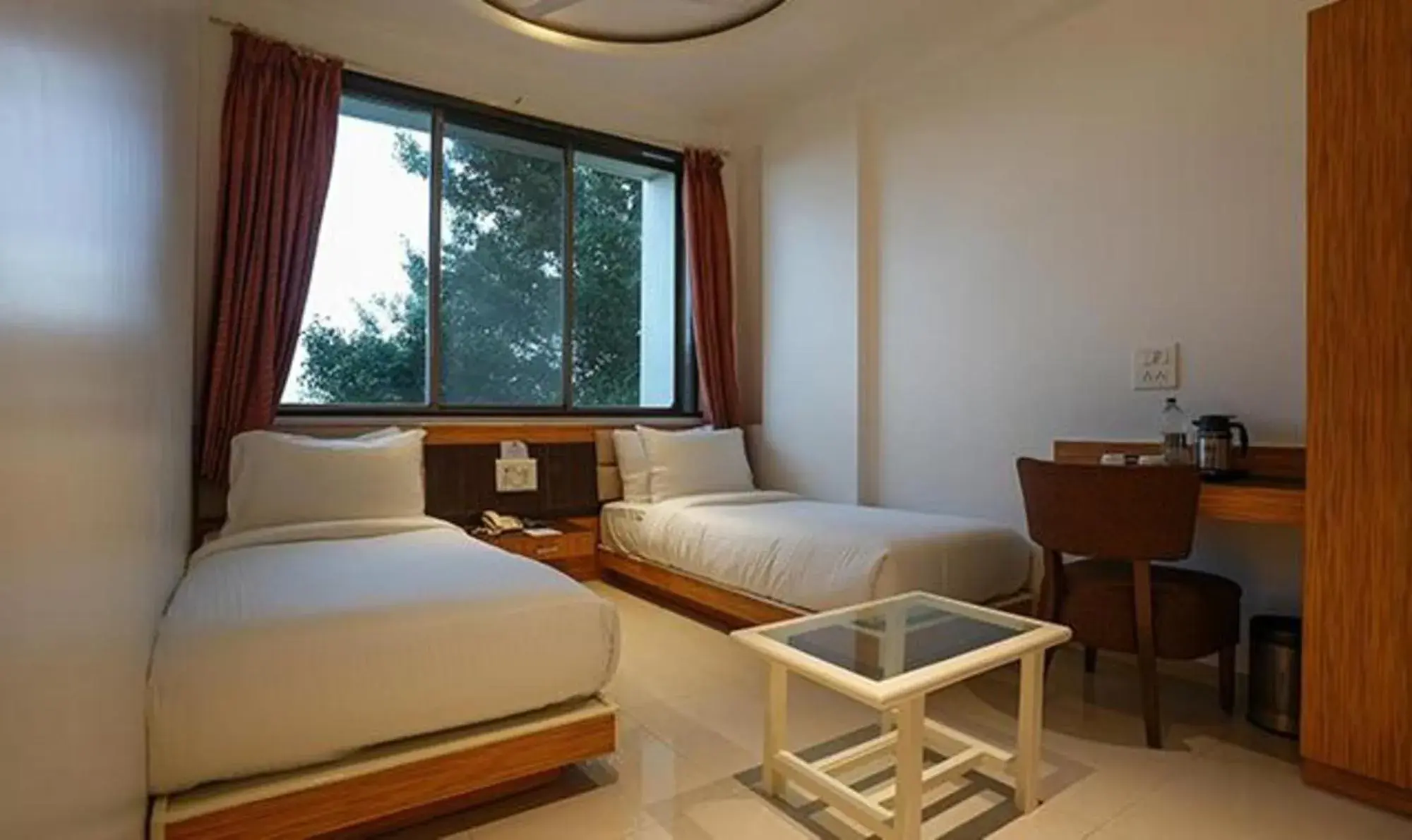 Bed in FabHotel Prime Rester Select - in chakan Bed in FabHotel Prime Rester Select - in chakan