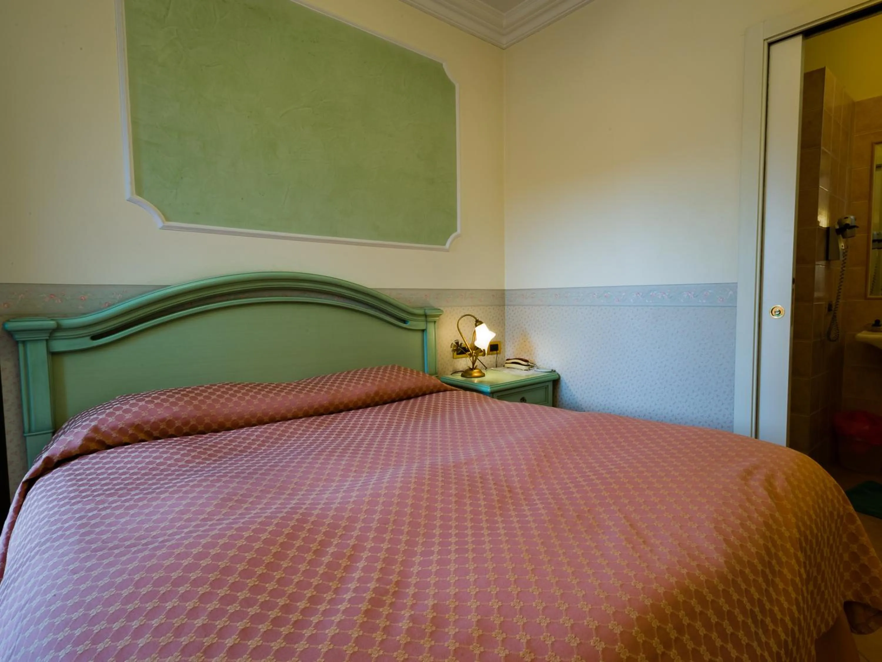 Bed in Hotel Louis II