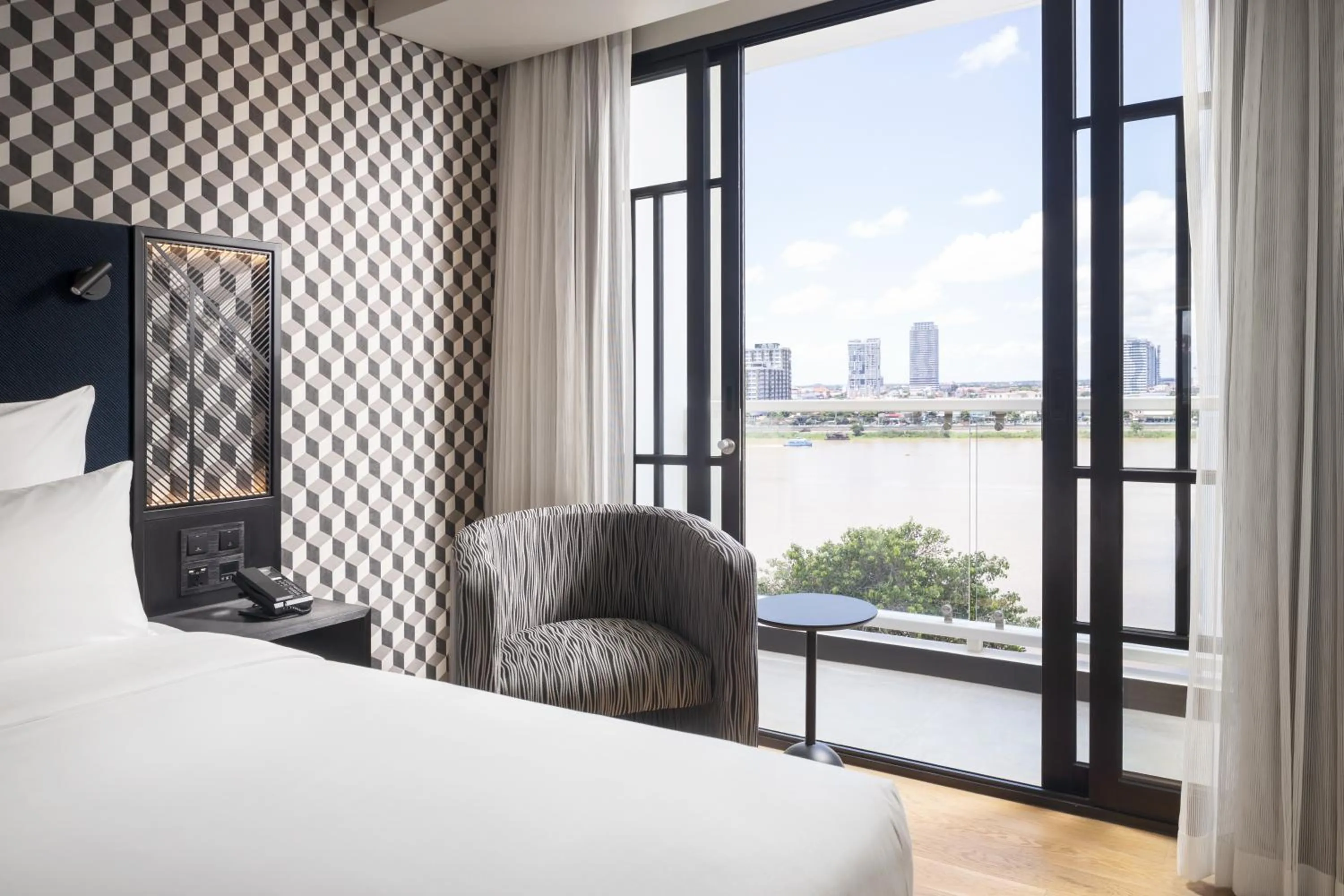 View (from property/room), Bed in TRIBE Phnom Penh Post Office