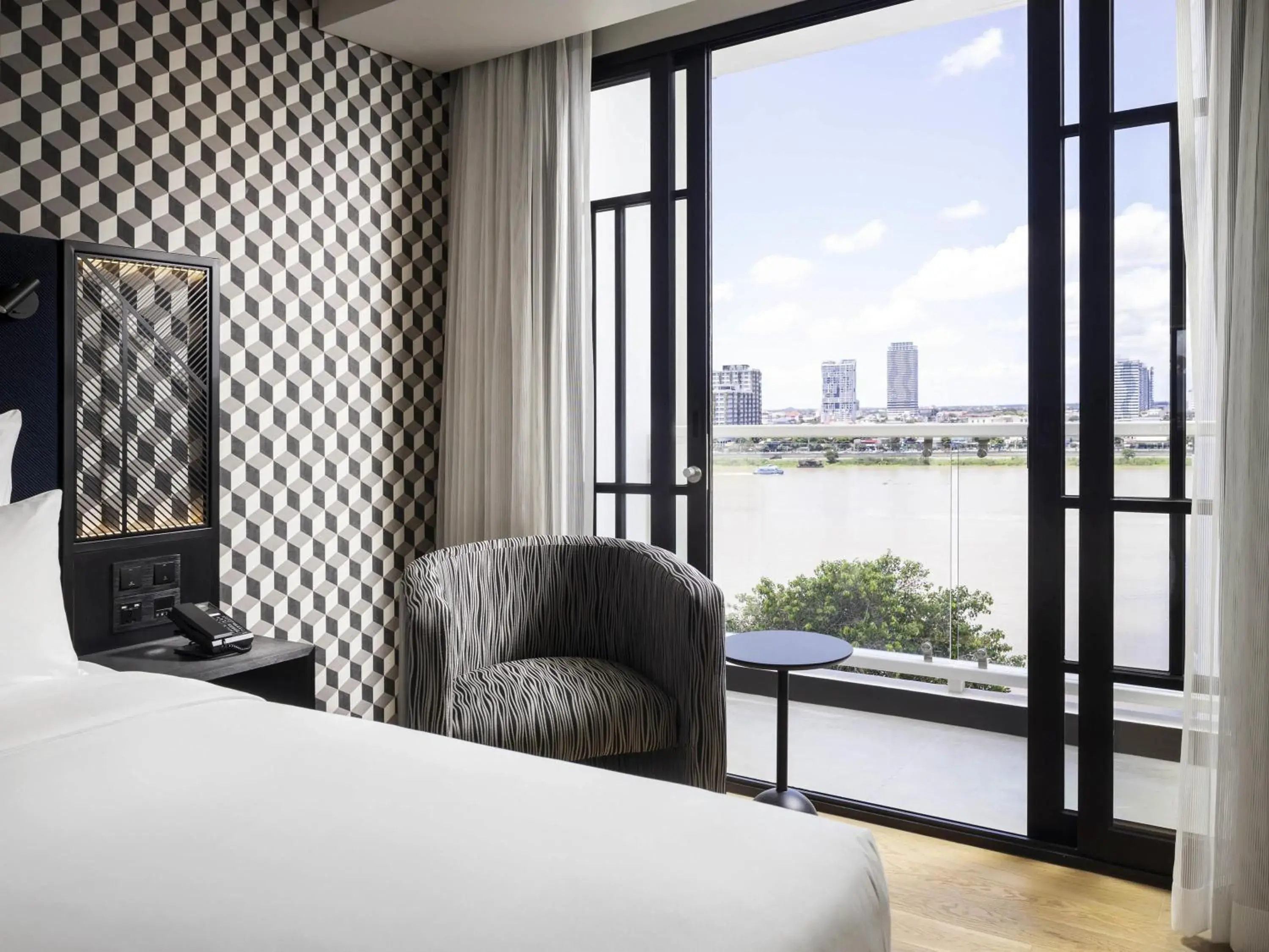 Bedroom, Bed in TRIBE Phnom Penh Post Office Bedroom, Bed in TRIBE Phnom Penh Post Office