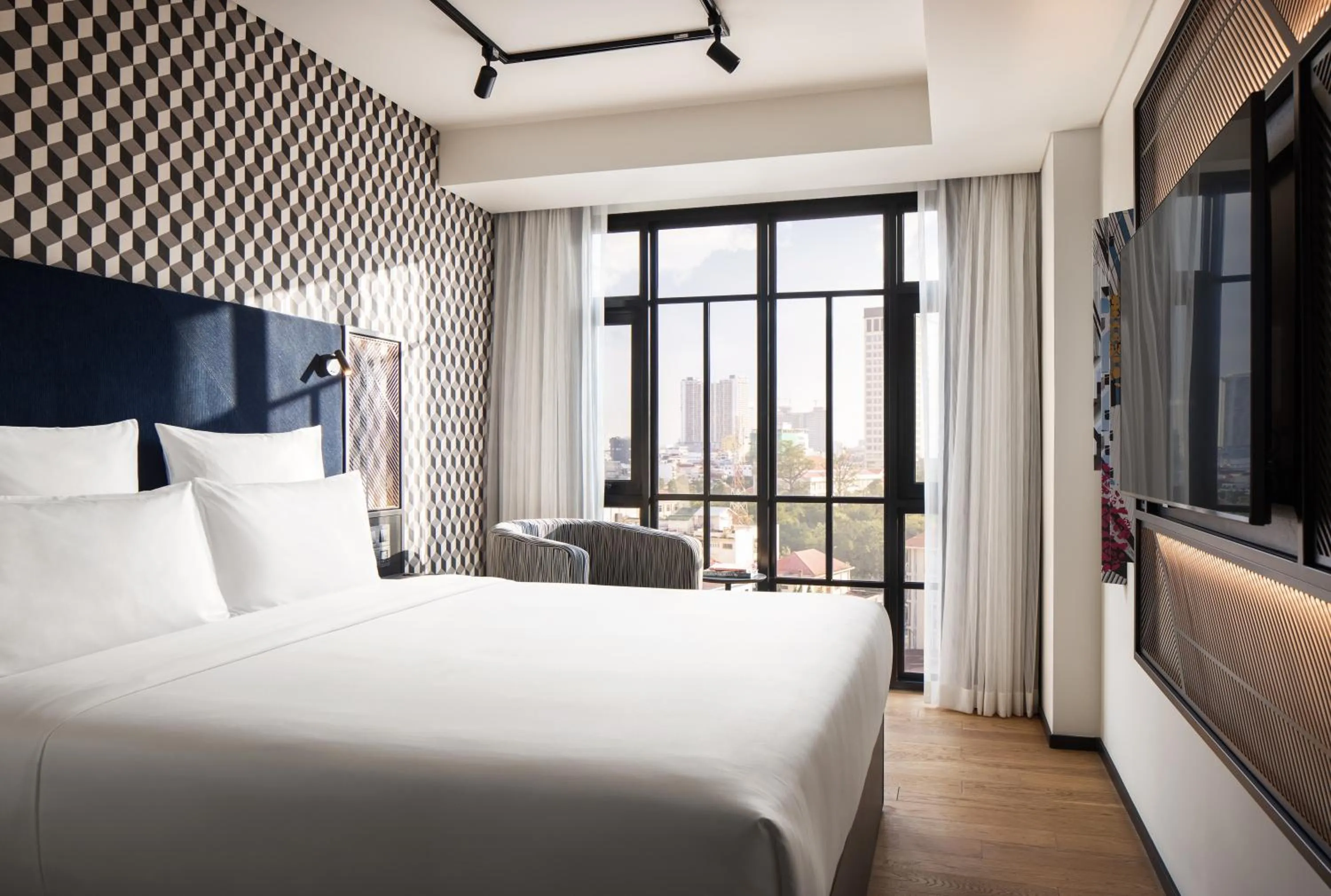 Bed in TRIBE Phnom Penh Post Office