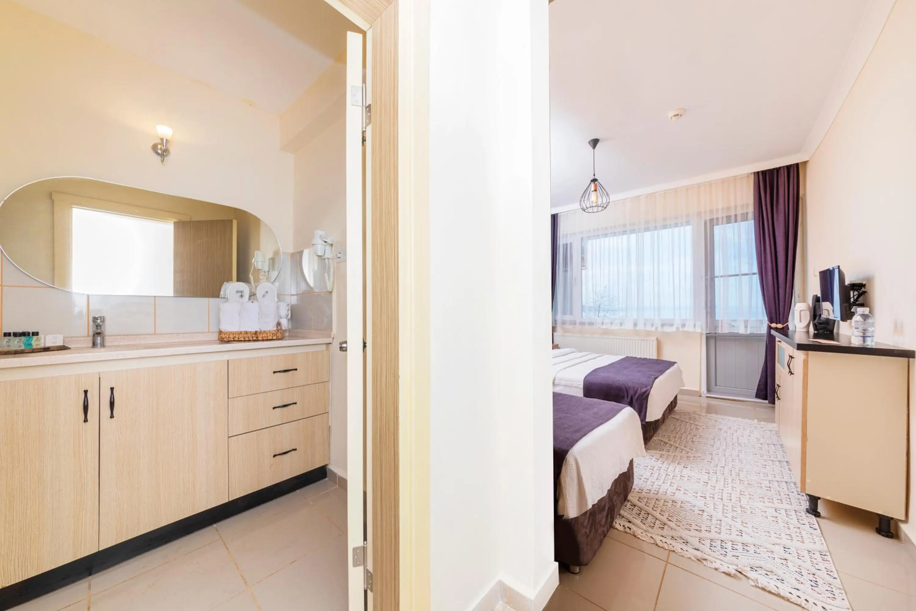 Bed in KİRAZ BEACH OTEL