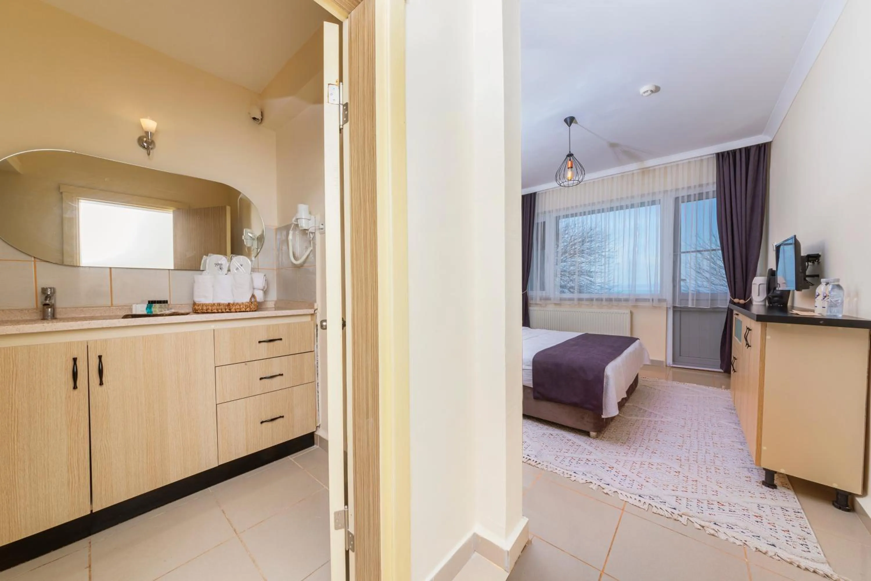 Bed in KİRAZ BEACH OTEL