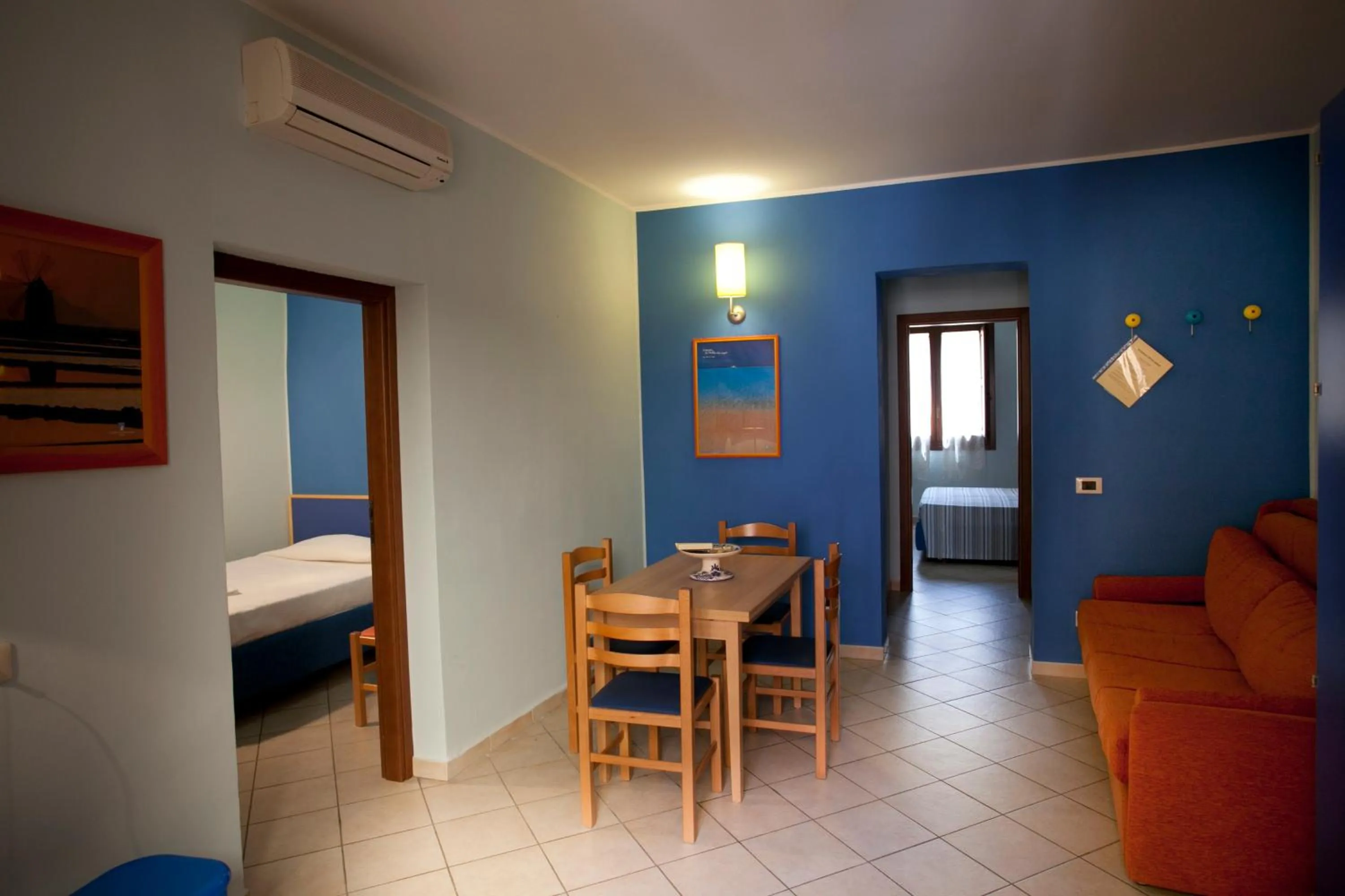 Living room, Bed in Residence Cortile Mercè