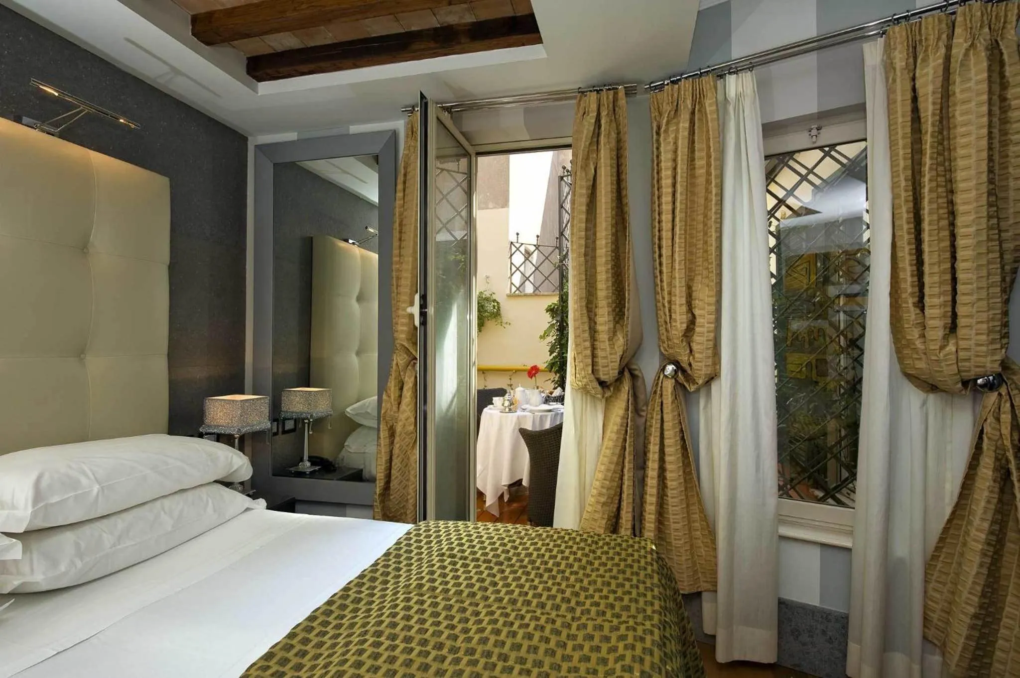 Decorative detail, Bed in Duca d'Alba Hotel - Chateaux & Hotels Collection