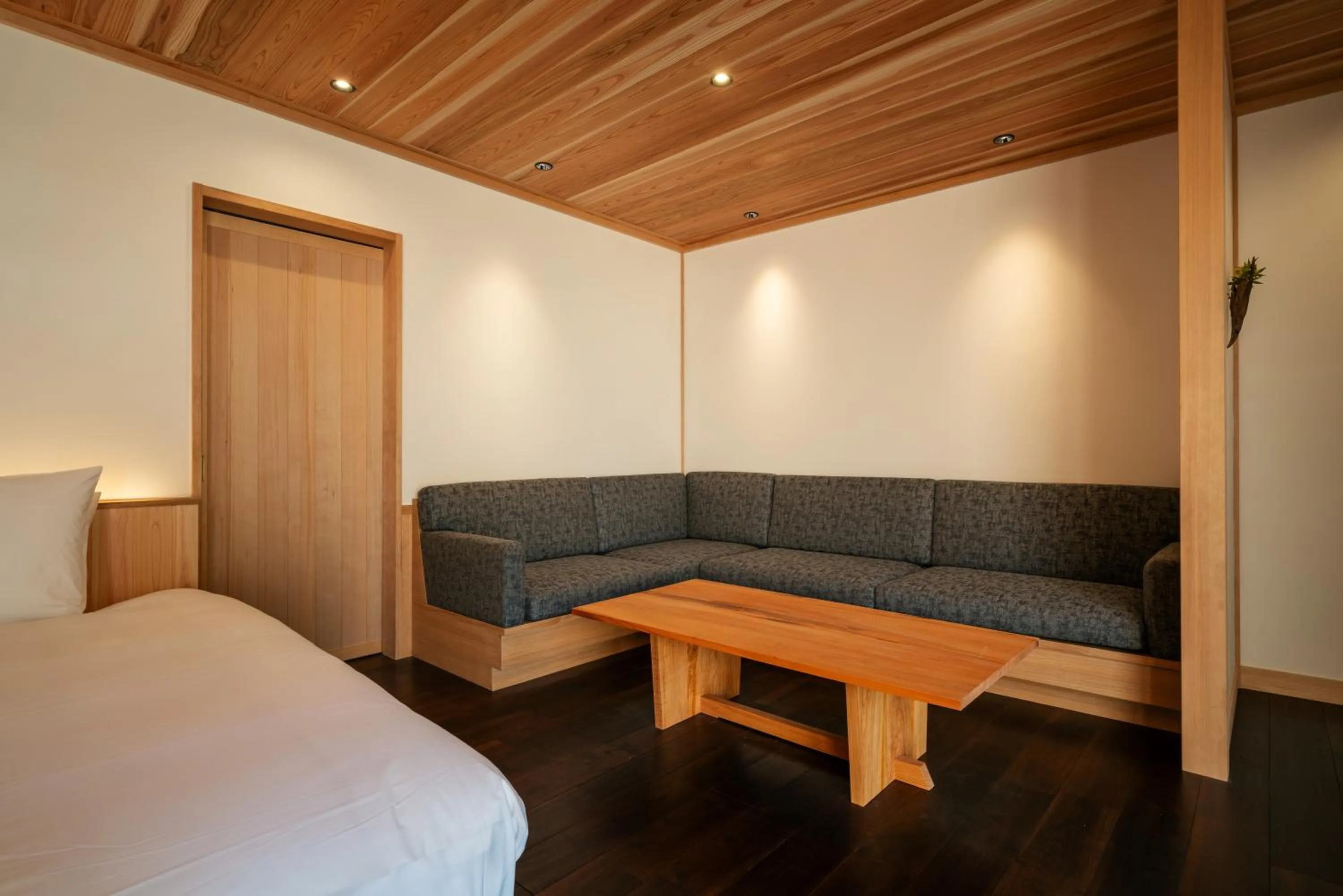 Living room, Bed in BYAKU Narai