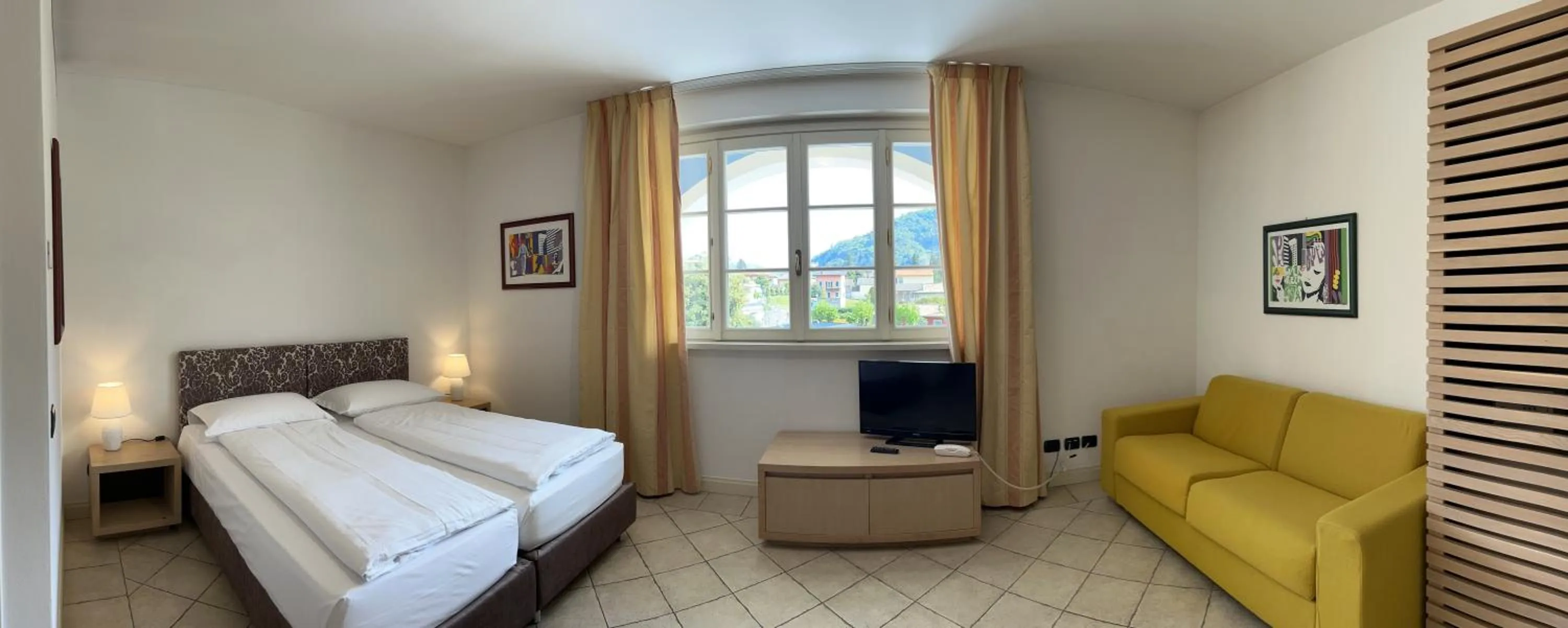 Living room, Bed in Aquazzurra Resort & Aparthotel