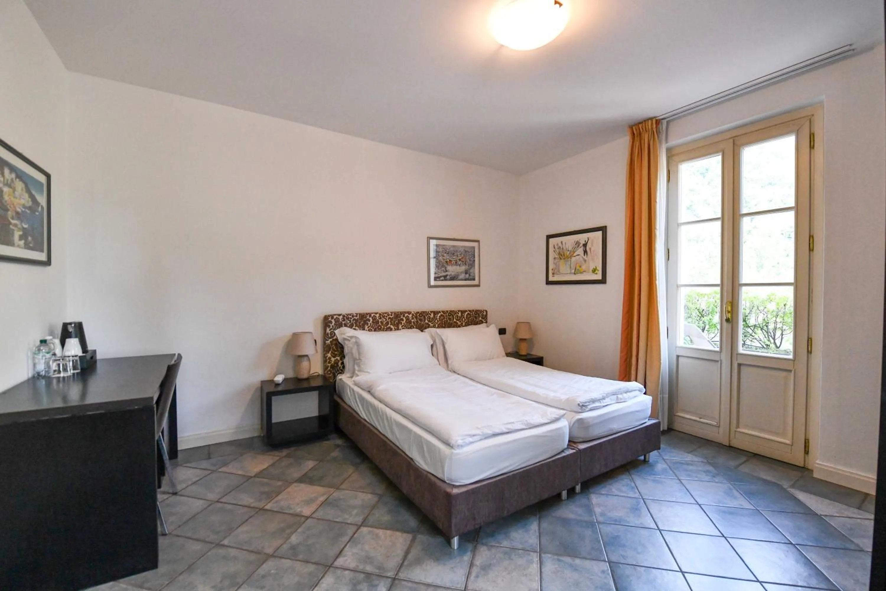 Bed in Aquazzurra Resort & Aparthotel