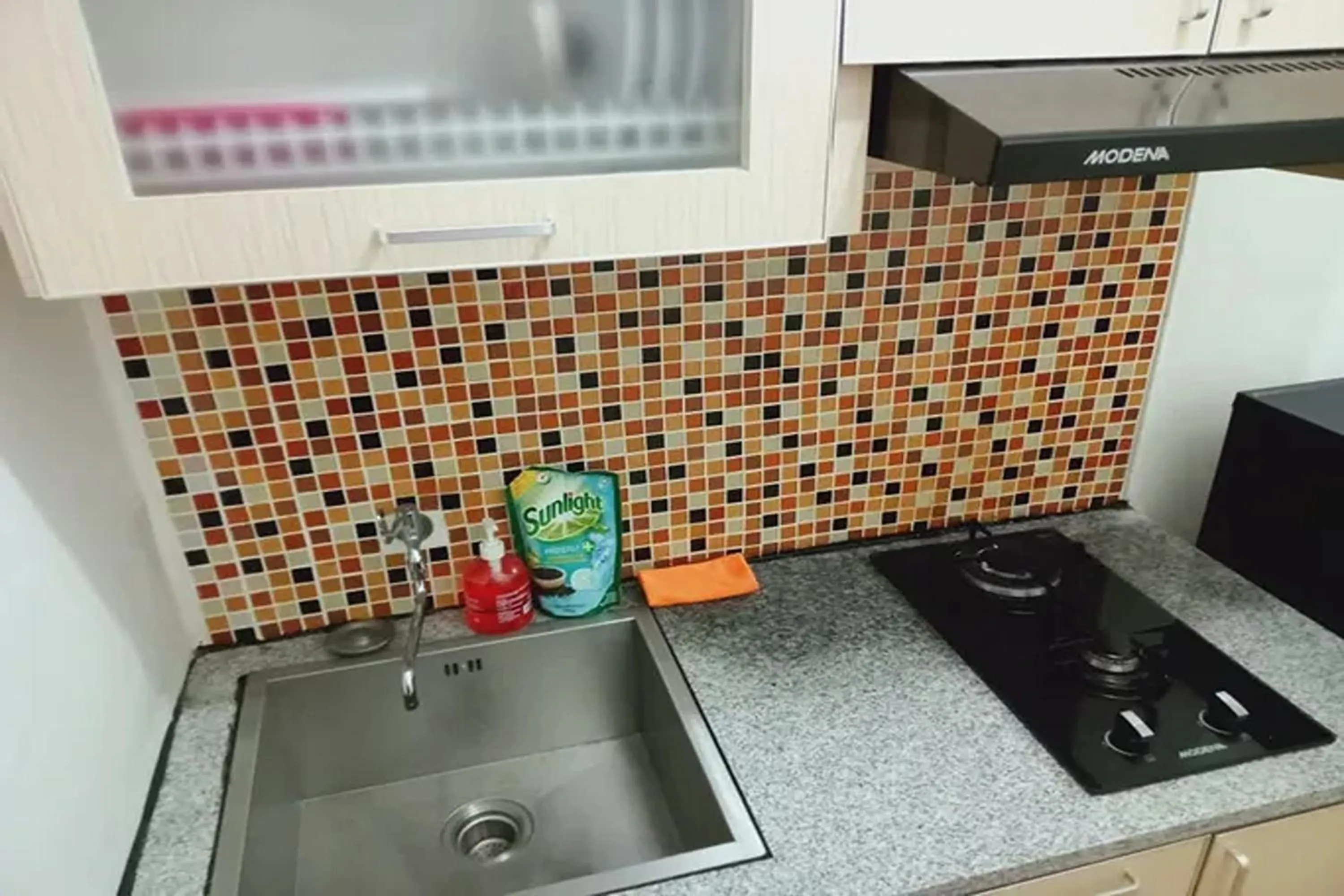 Kitchen or kitchenette in Velito at Podomoro Golf View Apartment