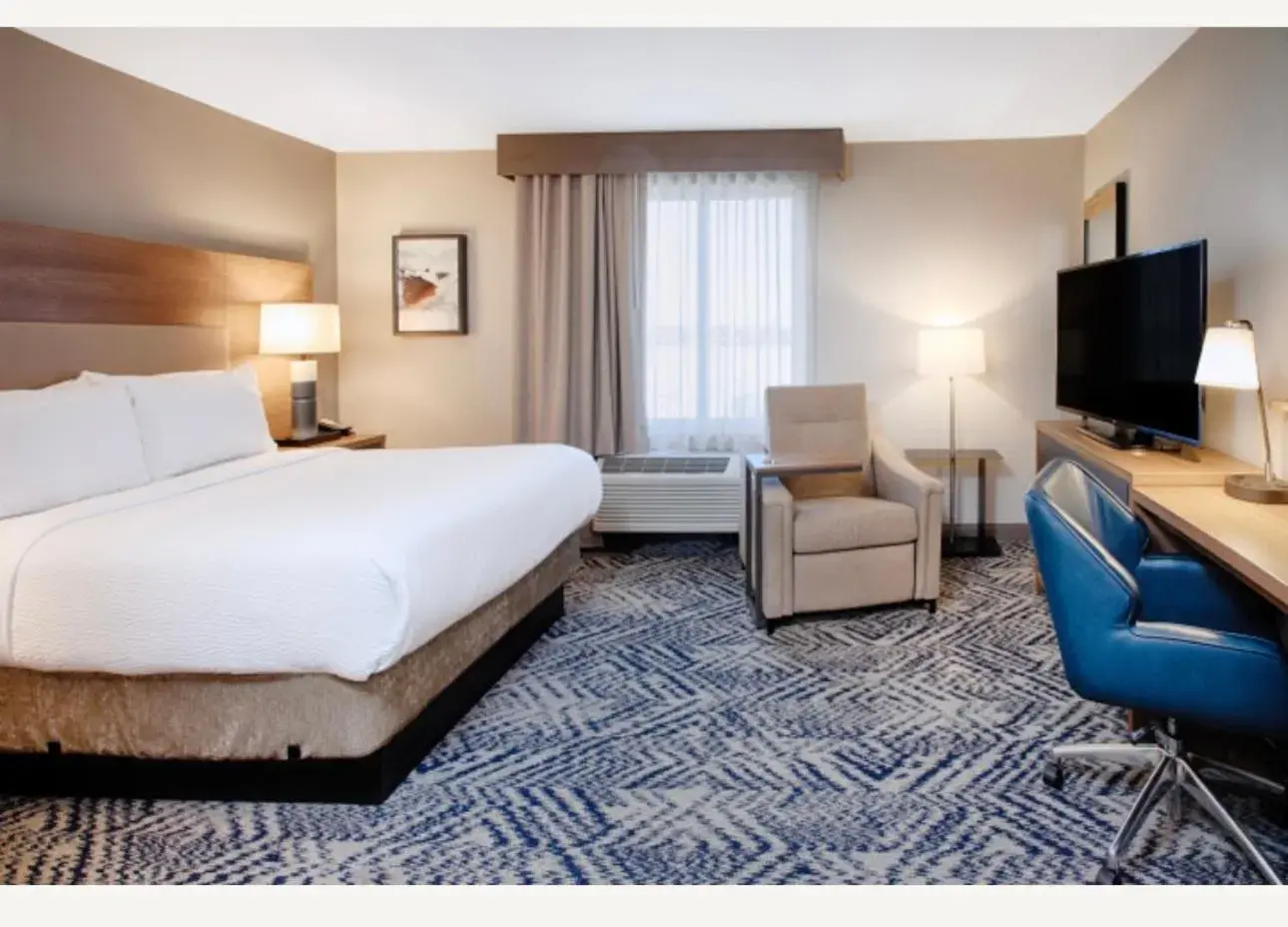 Bed in Candlewood Suites Detroit Sterling Heights by IHG Bed in Candlewood Suites Detroit Sterling Heights by IHG