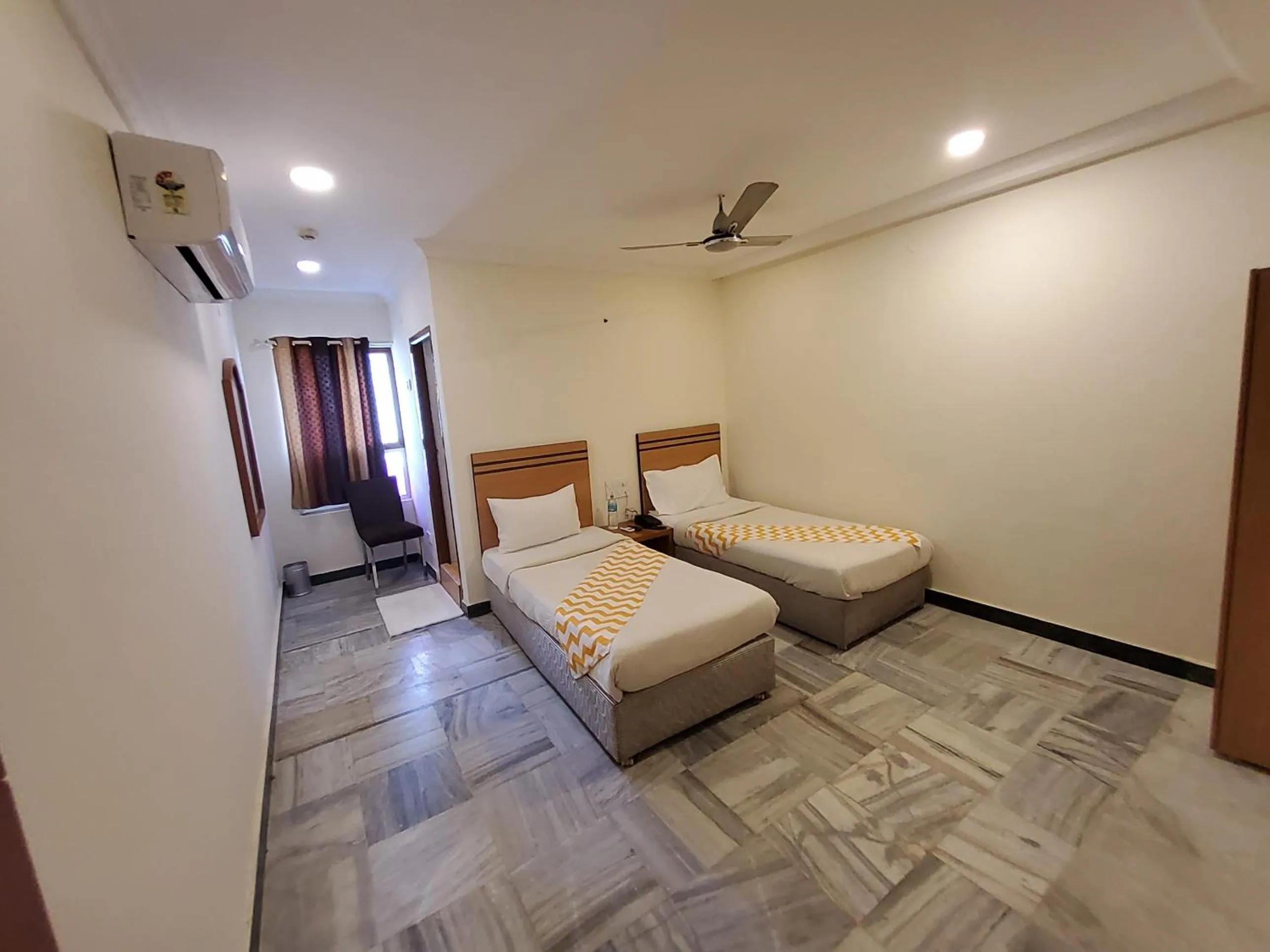 Photo of the whole room, Bed in GT Grande Hotel-Near US Consulate