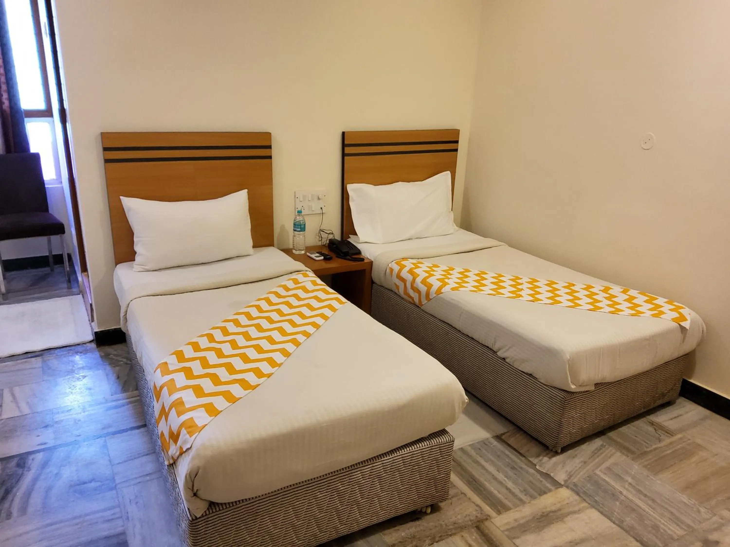 Bed in GT Grande Hotel-Near US Consulate