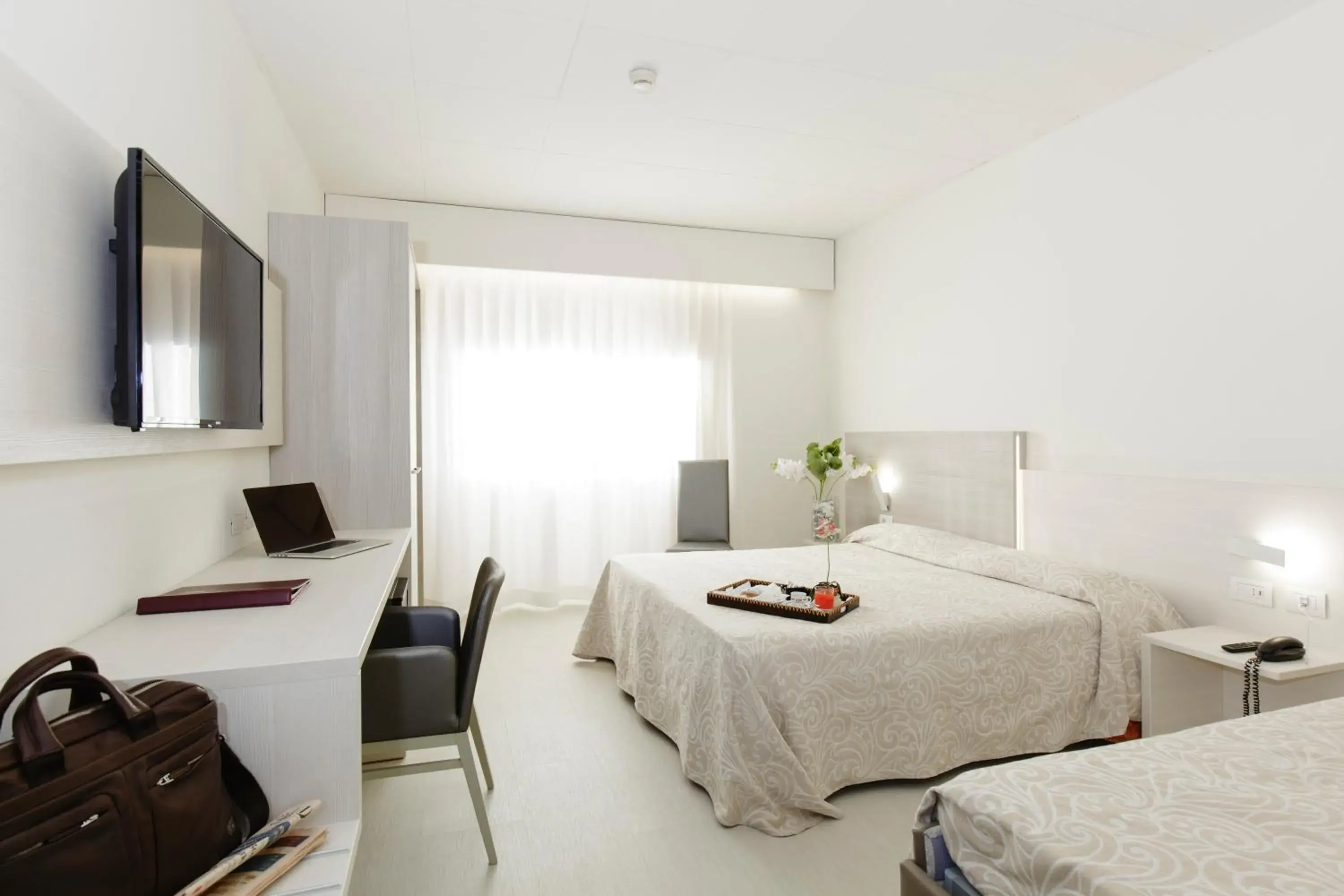 TV and multimedia, Bed in Alfa Fiera Hotel TV and multimedia, Bed in Alfa Fiera Hotel