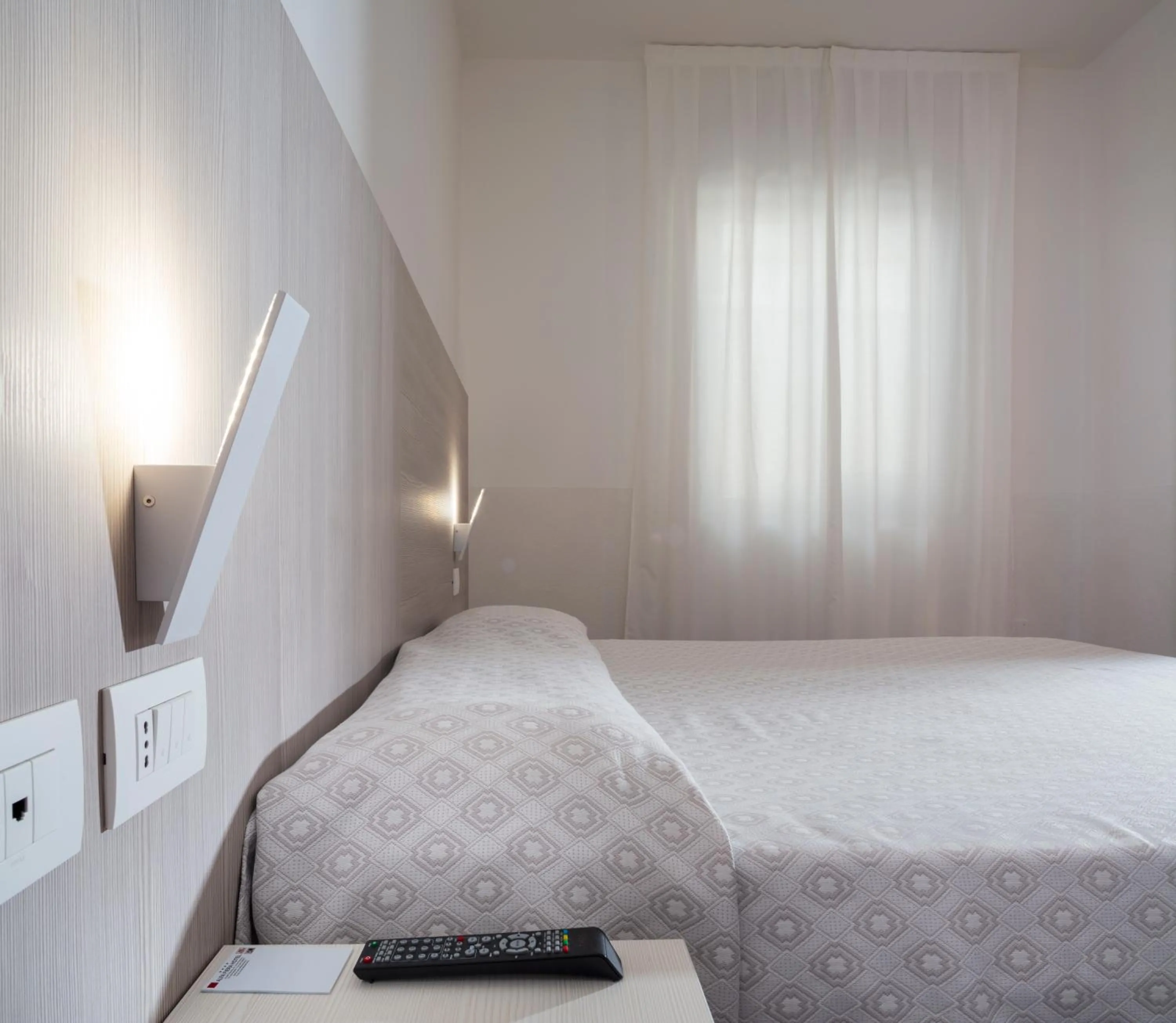 Bed in Alfa Fiera Hotel