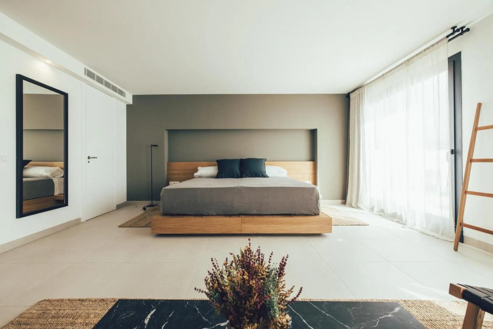 Bed in Cala Lanuza Suites