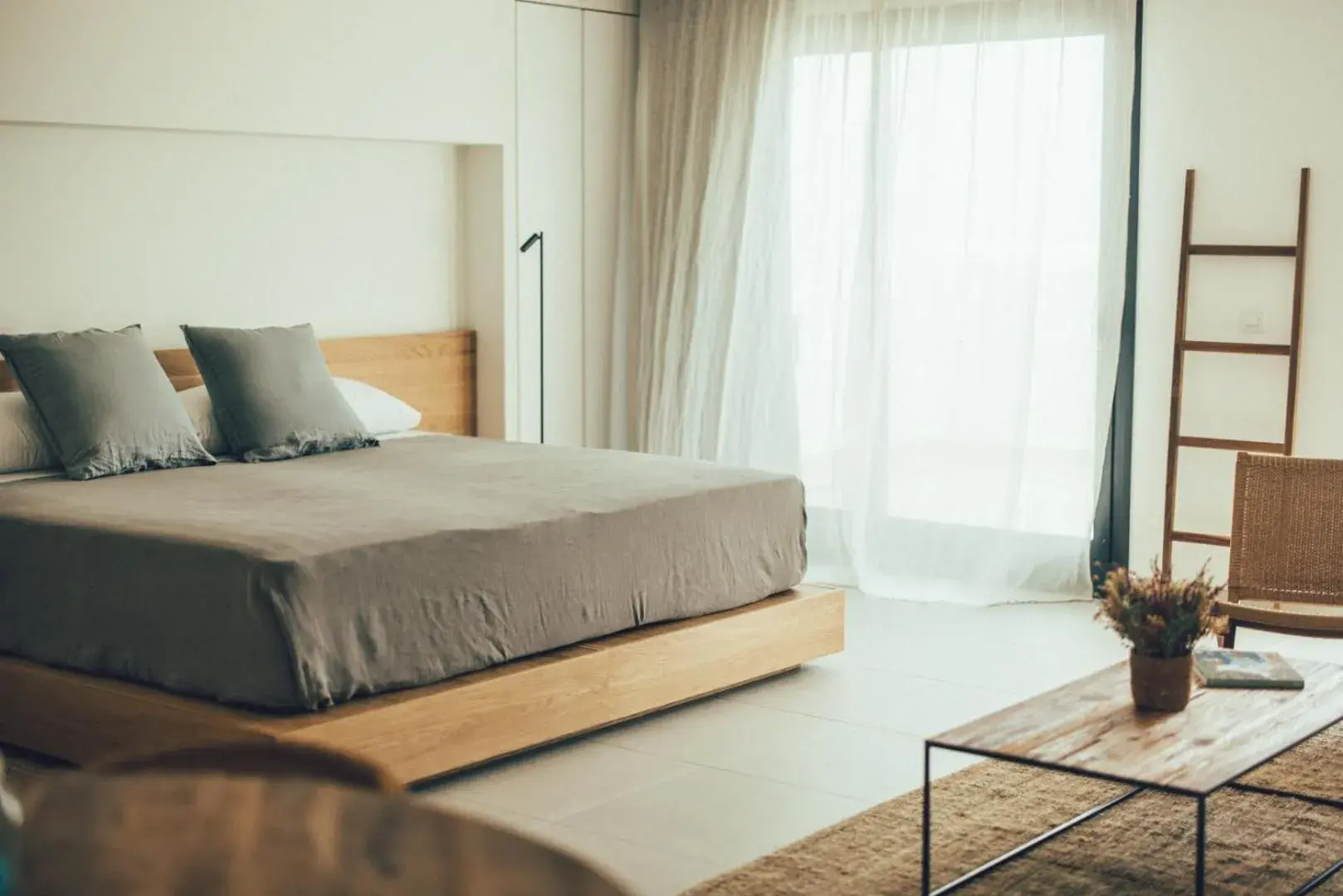 Bed in Cala Lanuza Suites Bed in Cala Lanuza Suites